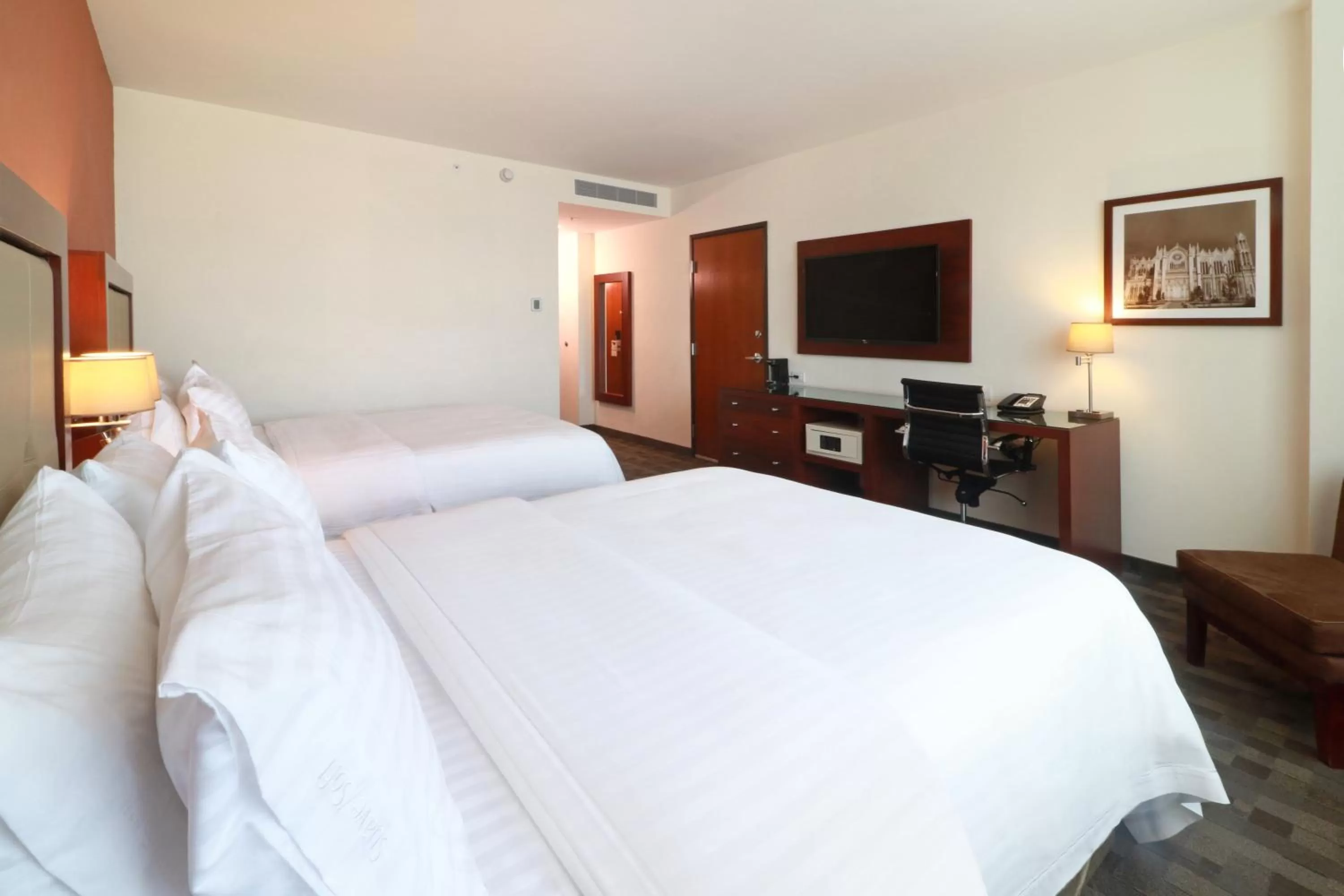 Photo of the whole room, Bed in Holiday Inn & Suites Plaza Mayor by IHG