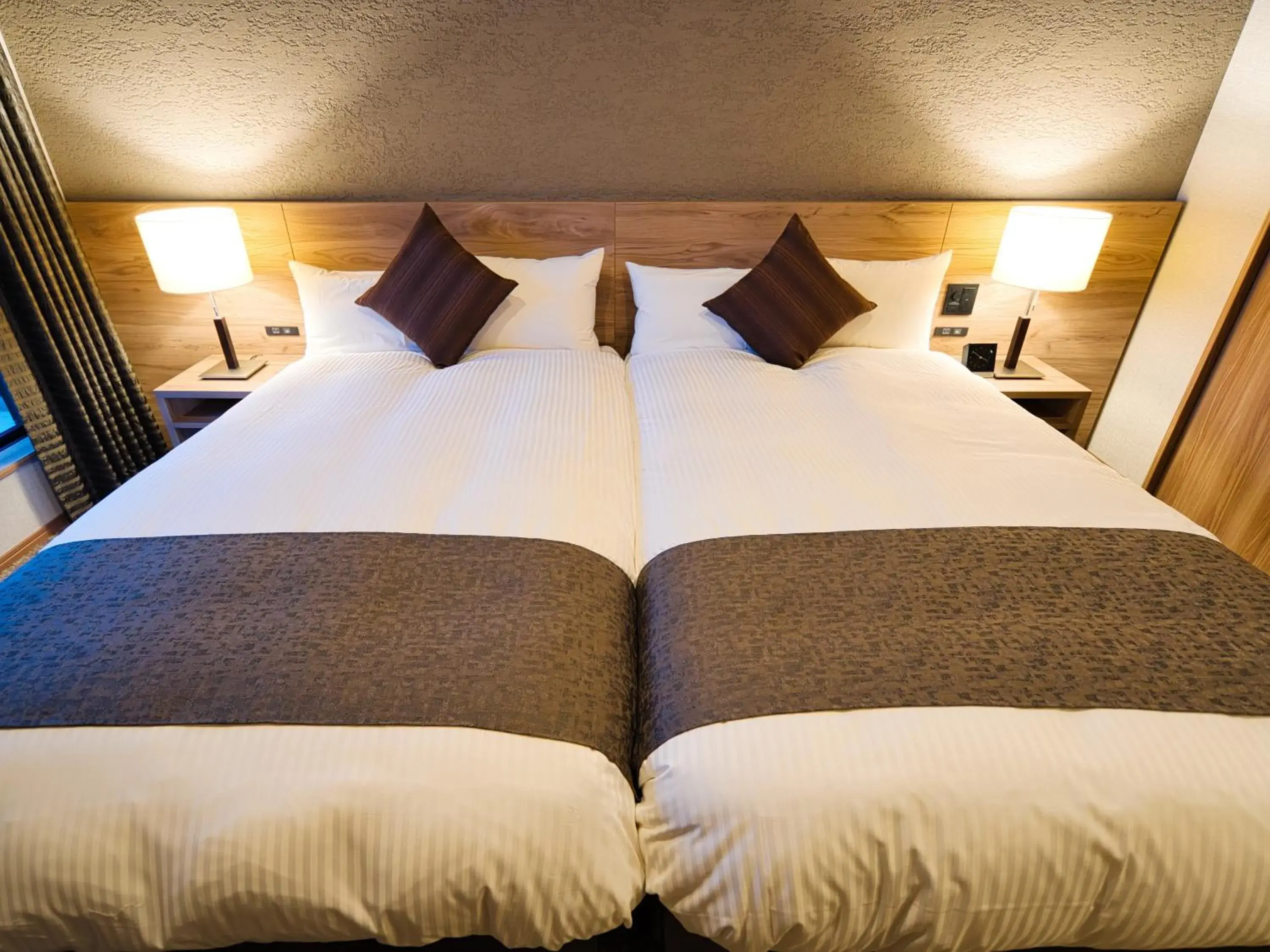 Bed in Winery Hotel and Condominium HITOHANA