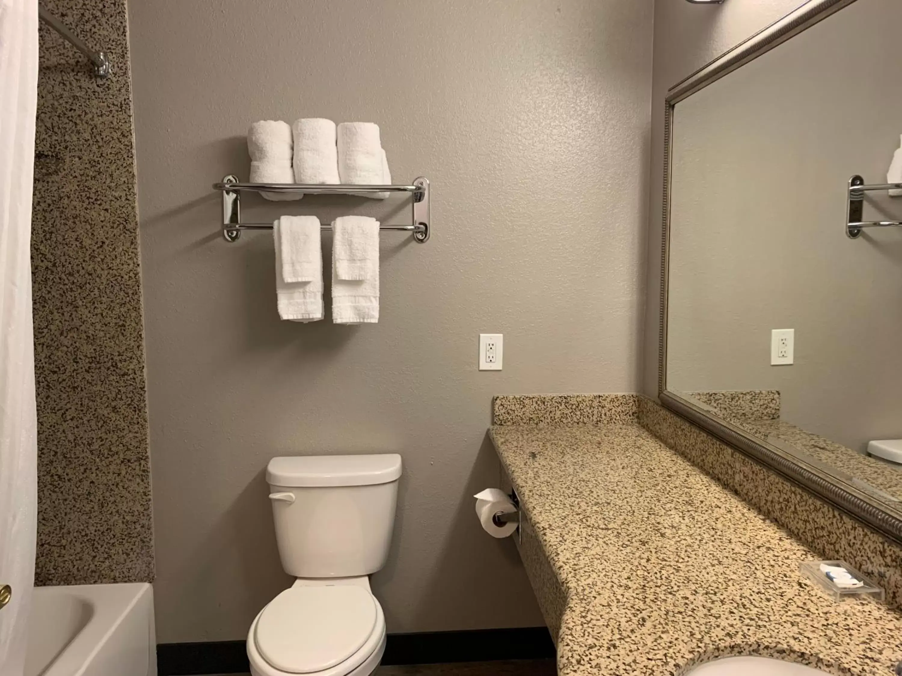 Toilet, Bathroom in Motel 6 Hobbs, NM - Event Center