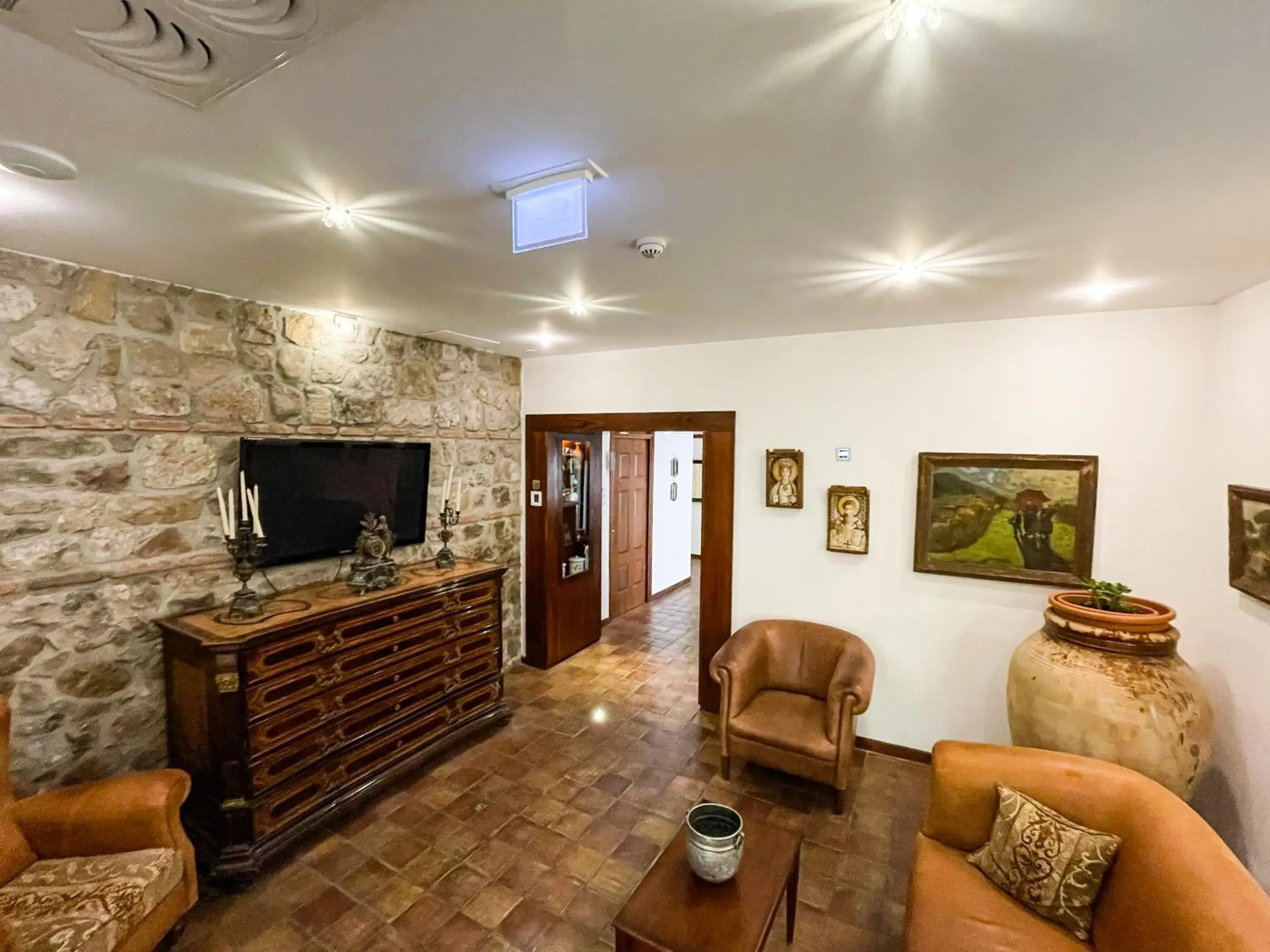 Communal lounge/ TV room, Seating Area in Hotel La Plumeria