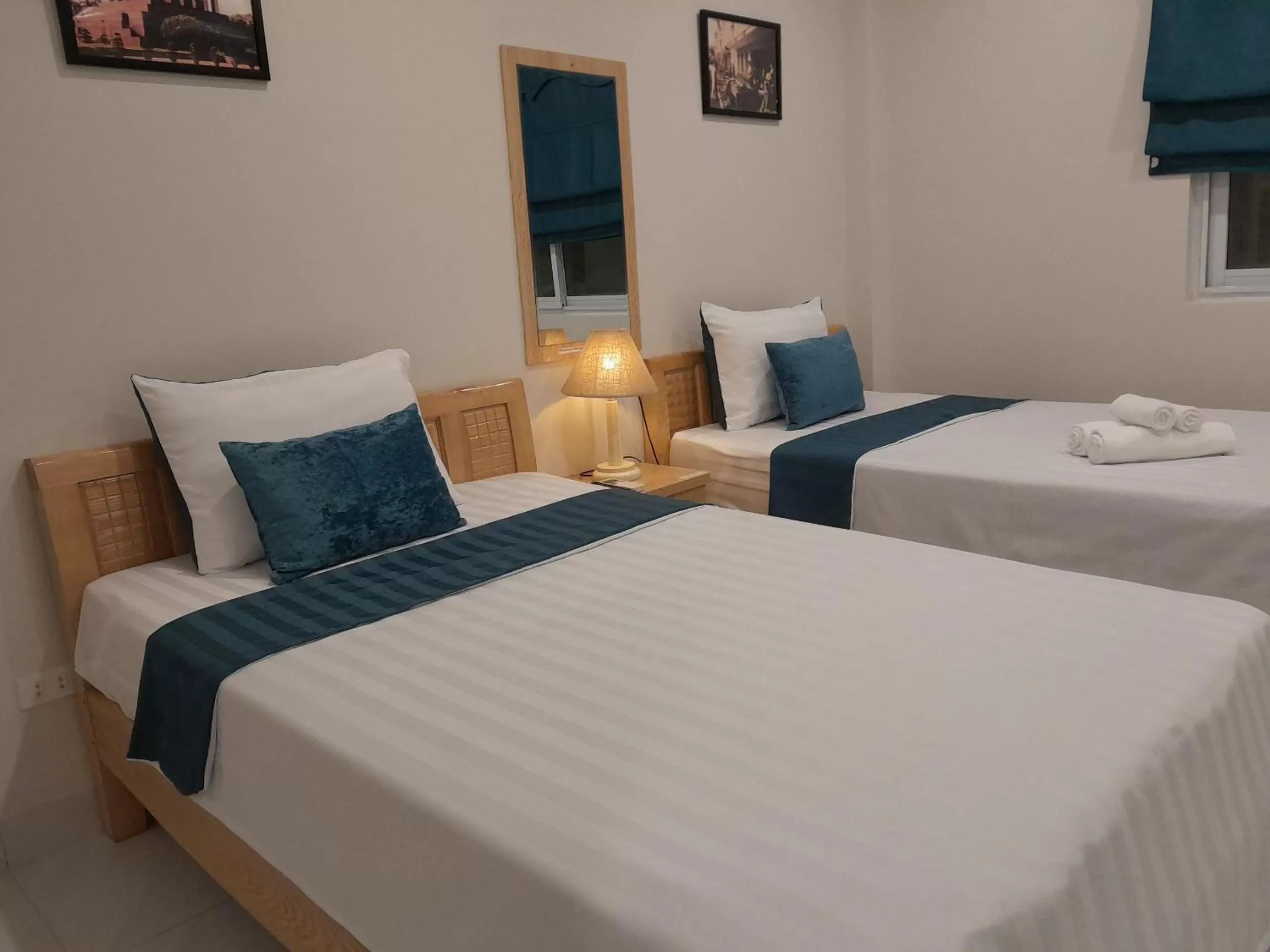 Bed in Hanoi Holiday Hotel