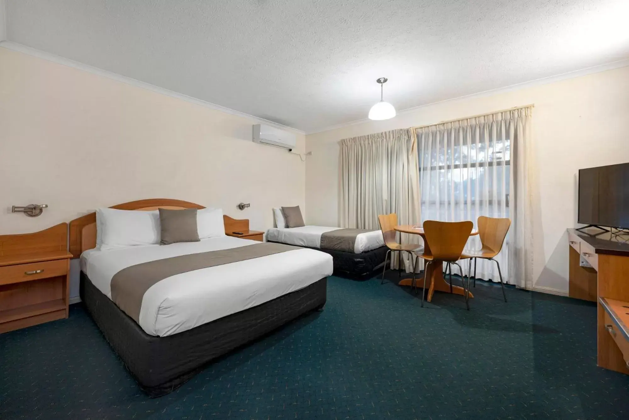 Bed in Pegasus Motor Inn and Serviced Apartments Bed in Pegasus Motor Inn and Serviced Apartments