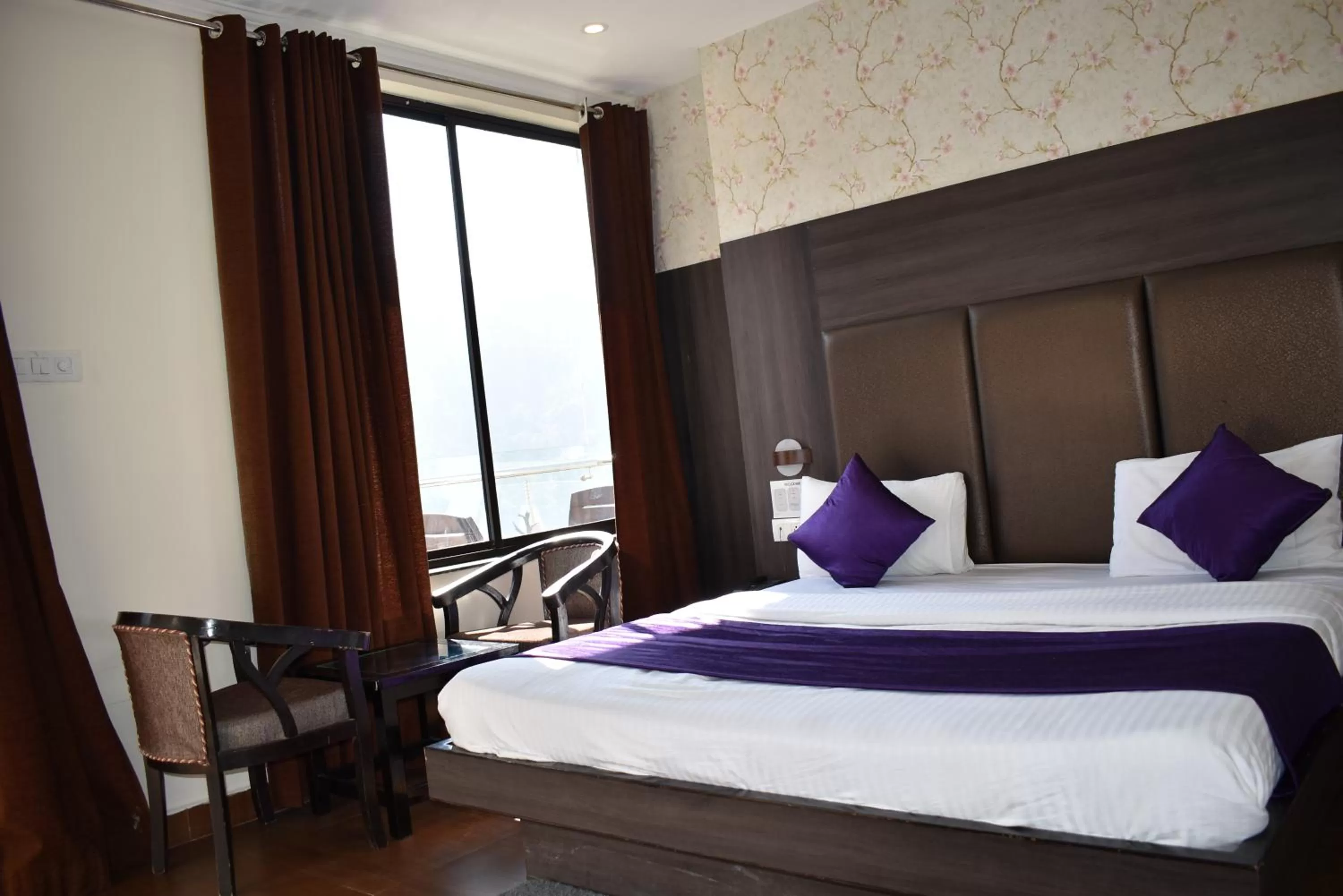 View (from property/room), Bed in Tapasthali by Meera Hotels