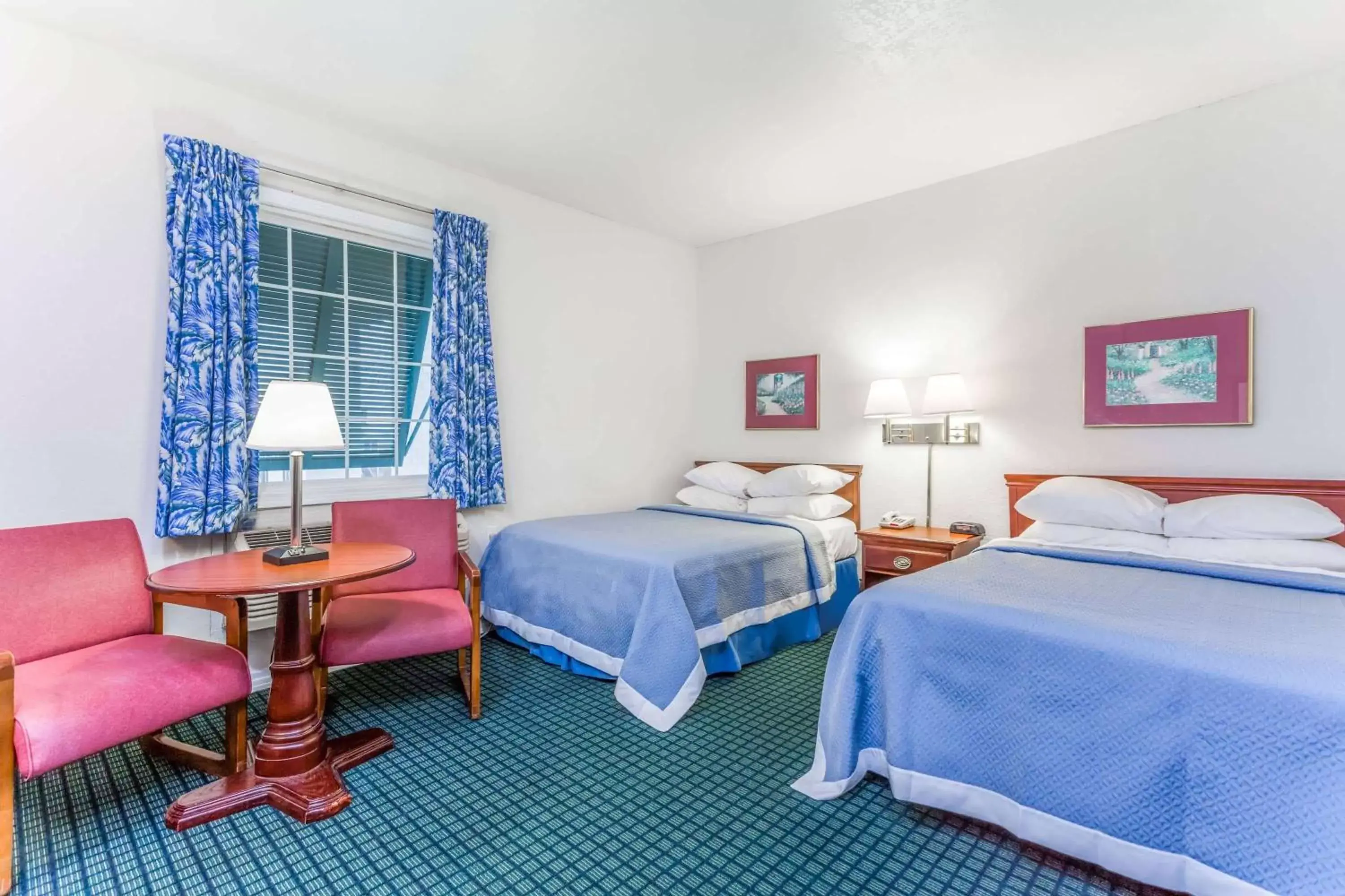 Photo of the whole room, Bed in Days Inn by Wyndham Kill Devil Hills Oceanfront - Wilbur