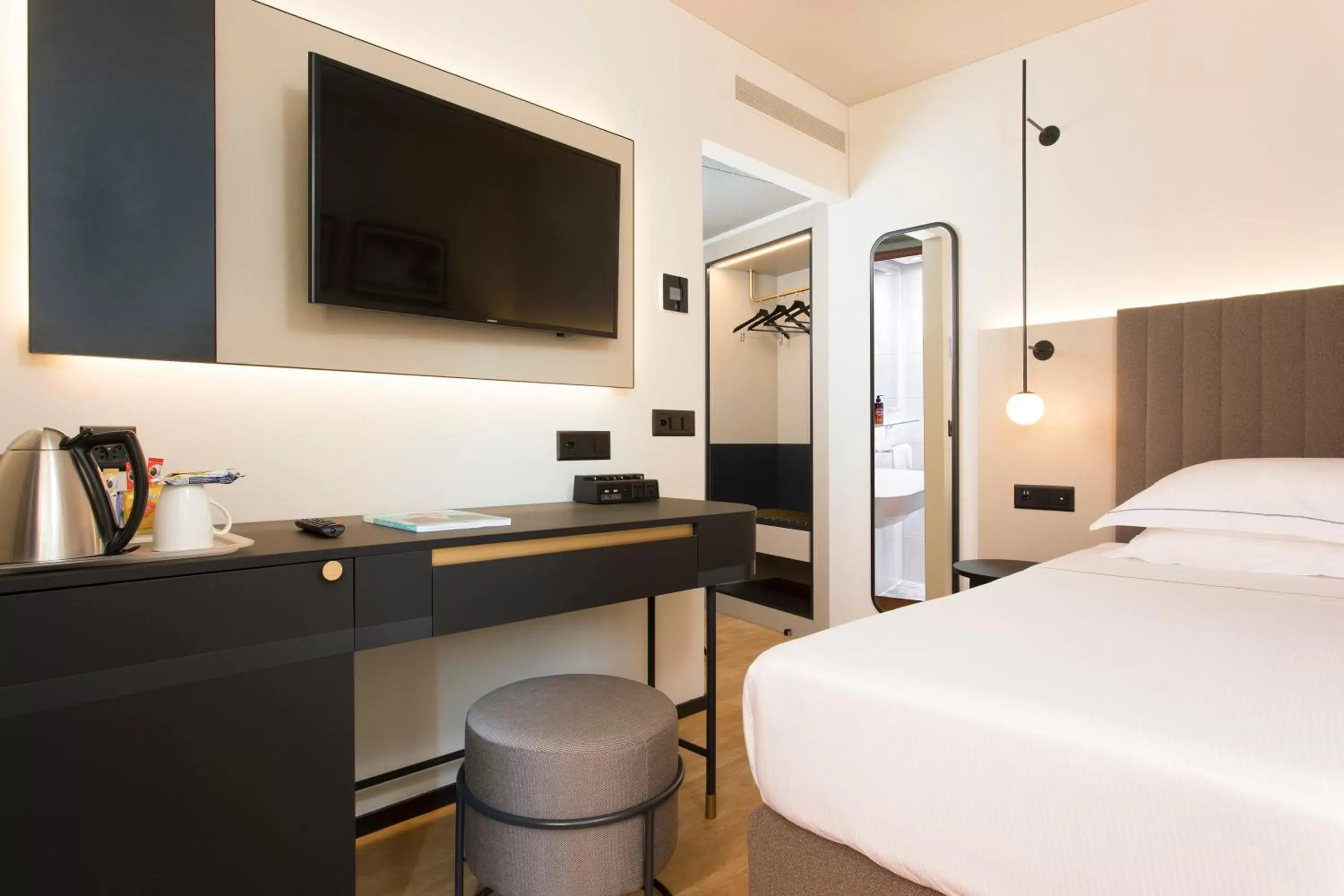 Bed in LUGANODANTE Boutique & Lifestyle Hotel Bed in LUGANODANTE Boutique & Lifestyle Hotel