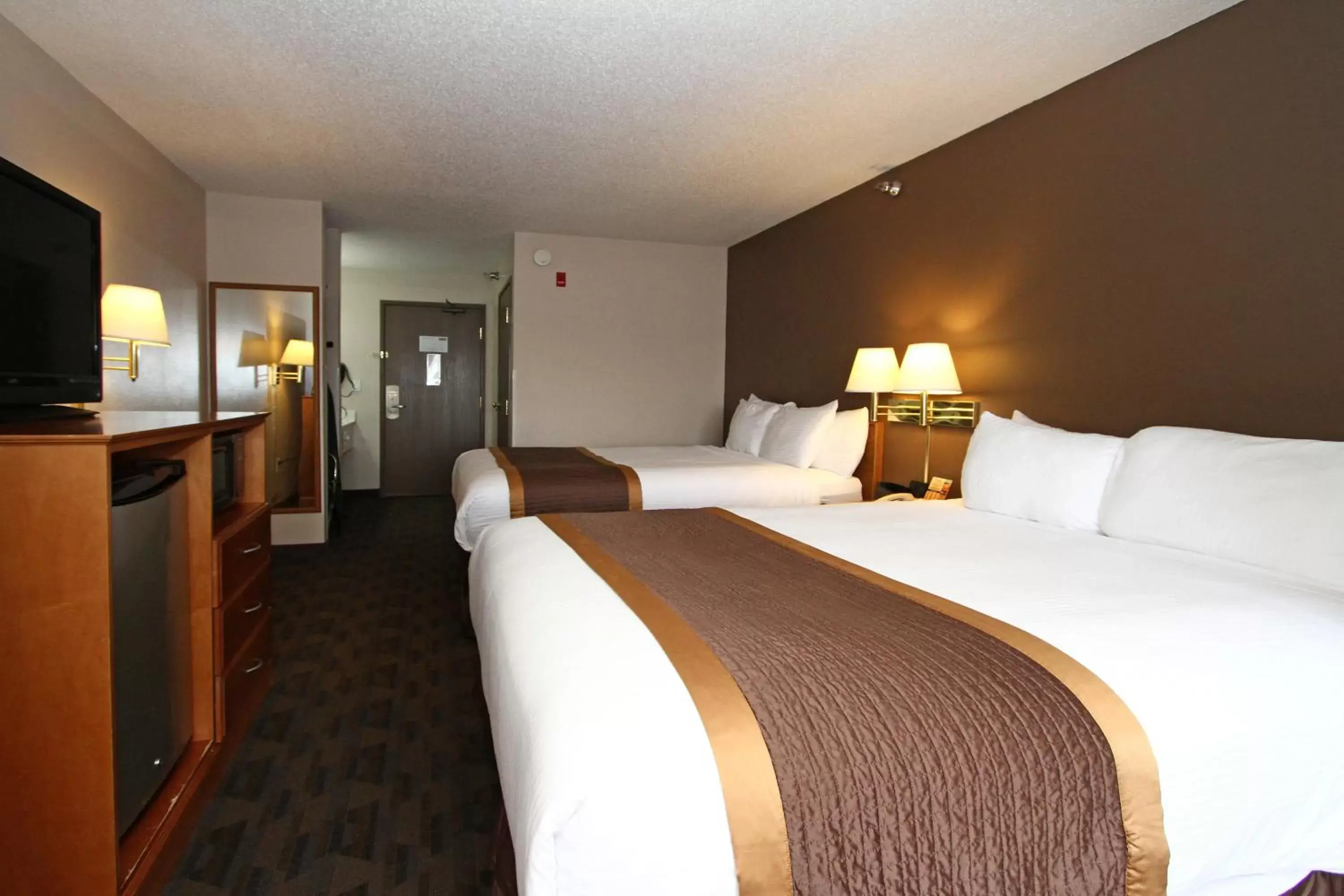 Bedroom in New Victorian Inn & Suites Lincoln