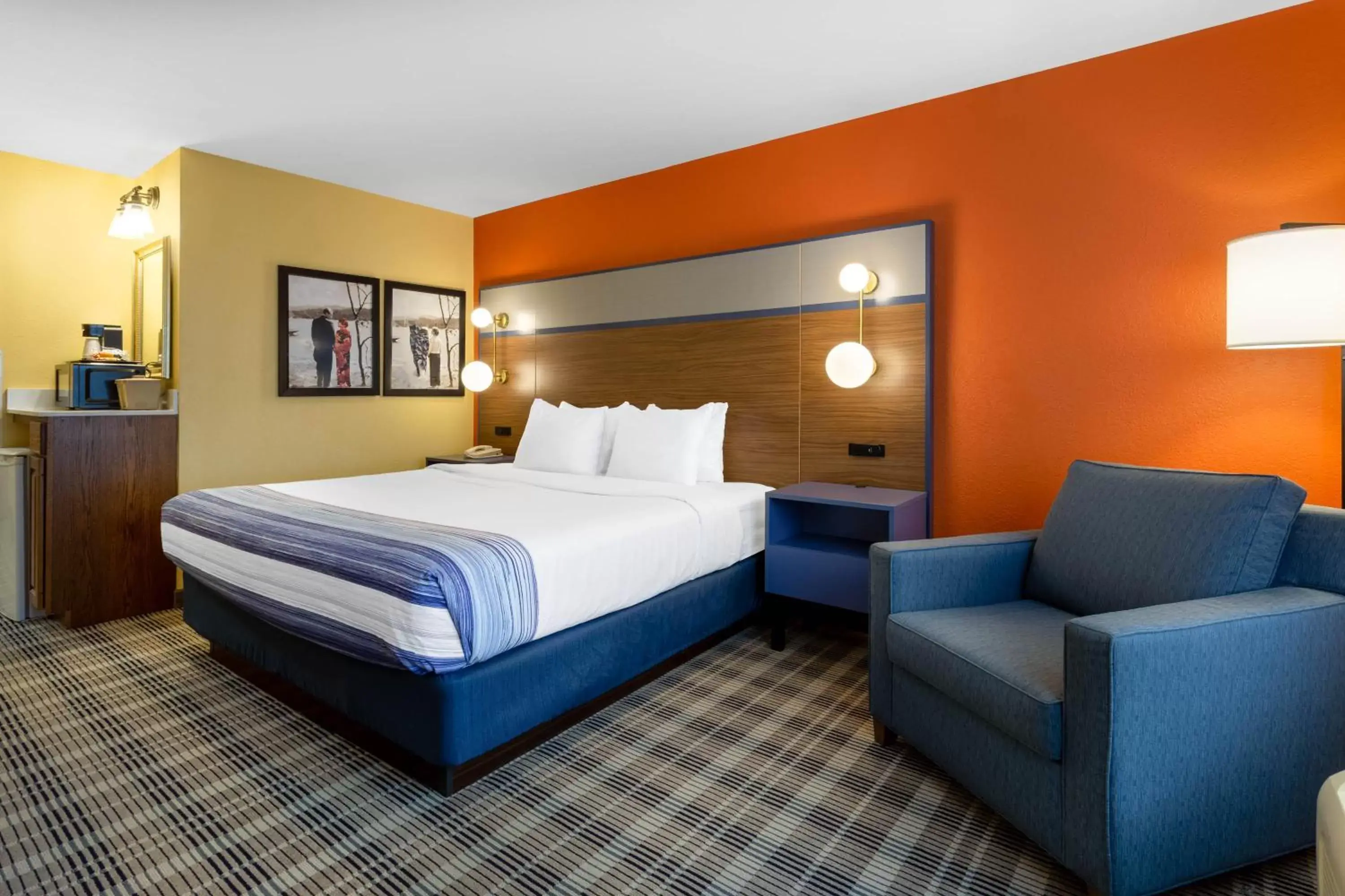 Bed in AmericInn by Wyndham Fulton Clinton