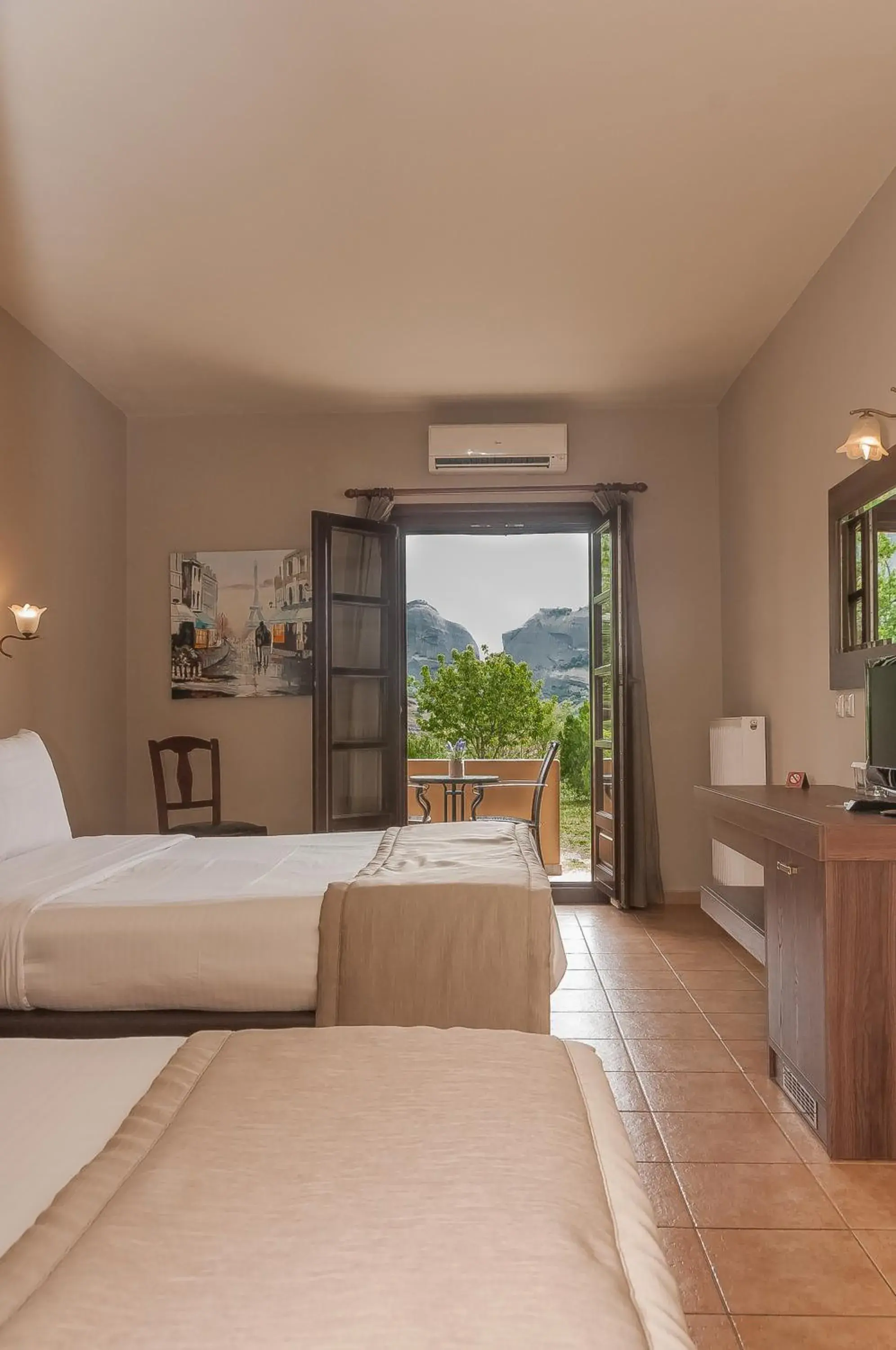 Triple Room Ground Floor with Garden & Meteora View  in Hotel Doupiani House