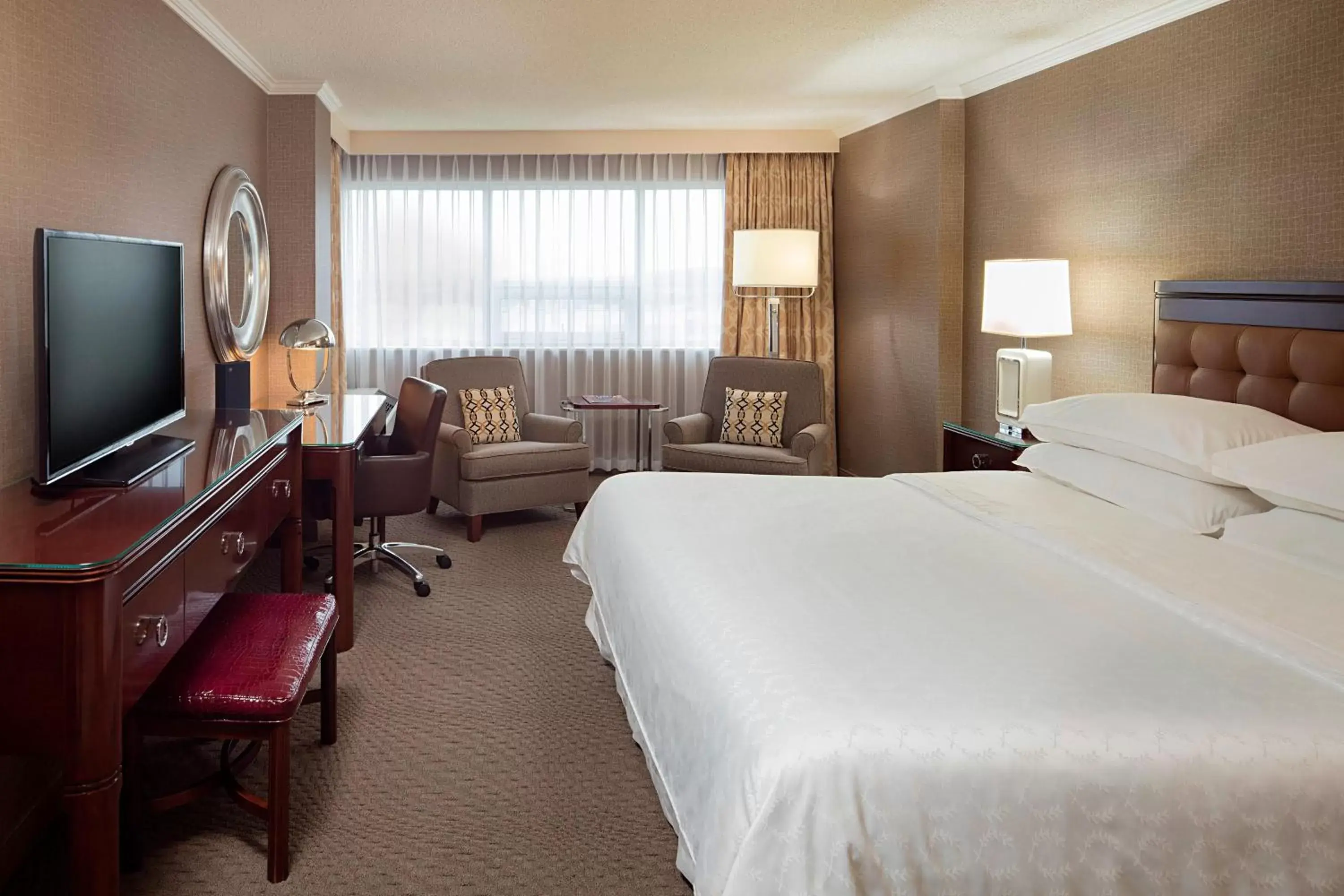 Photo of the whole room, TV/Entertainment Center in Sheraton Cavalier Calgary Hotel