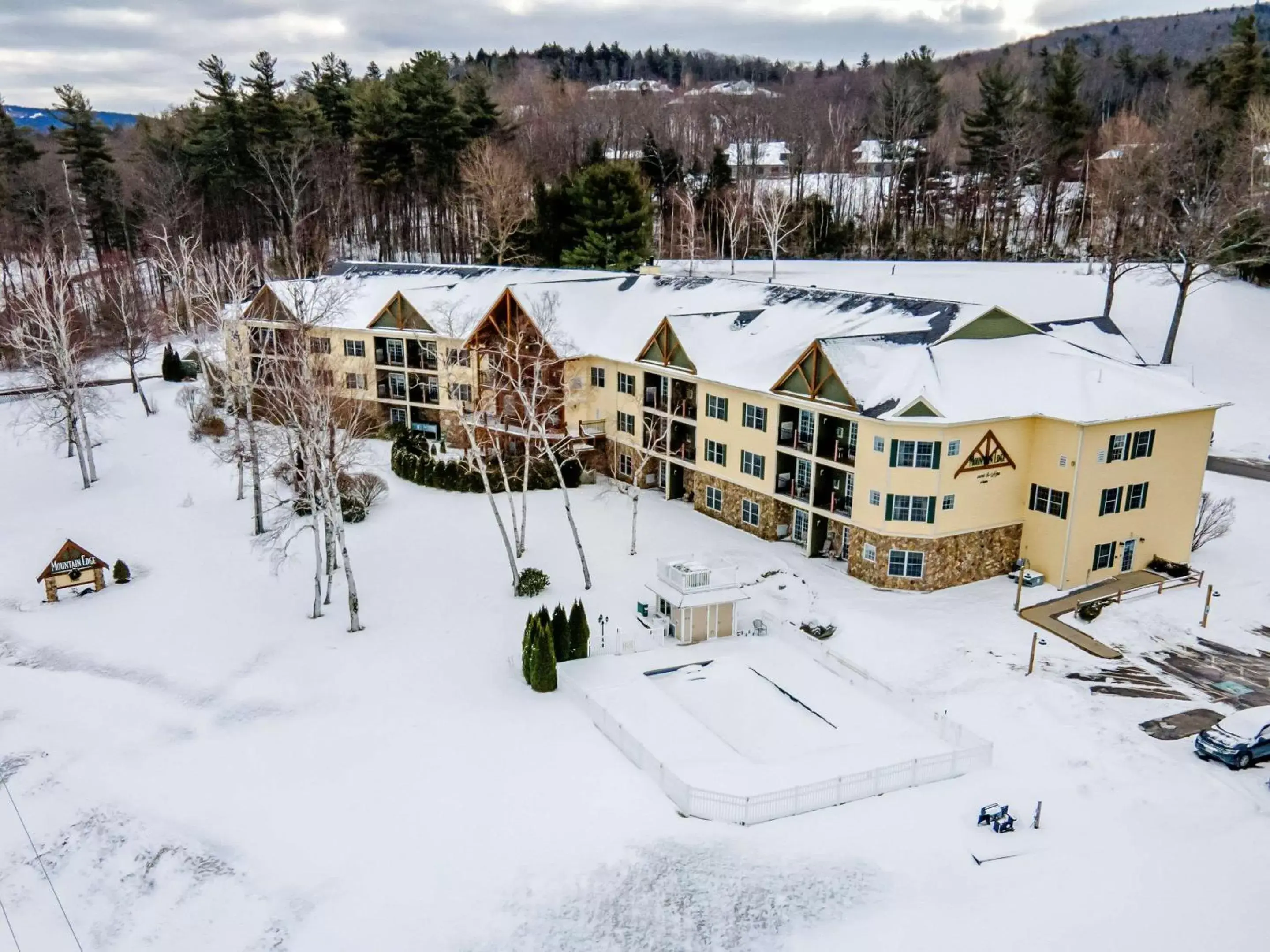Property building, Winter in Mountain Edge Suites at Sunapee, Ascend Hotel Collection