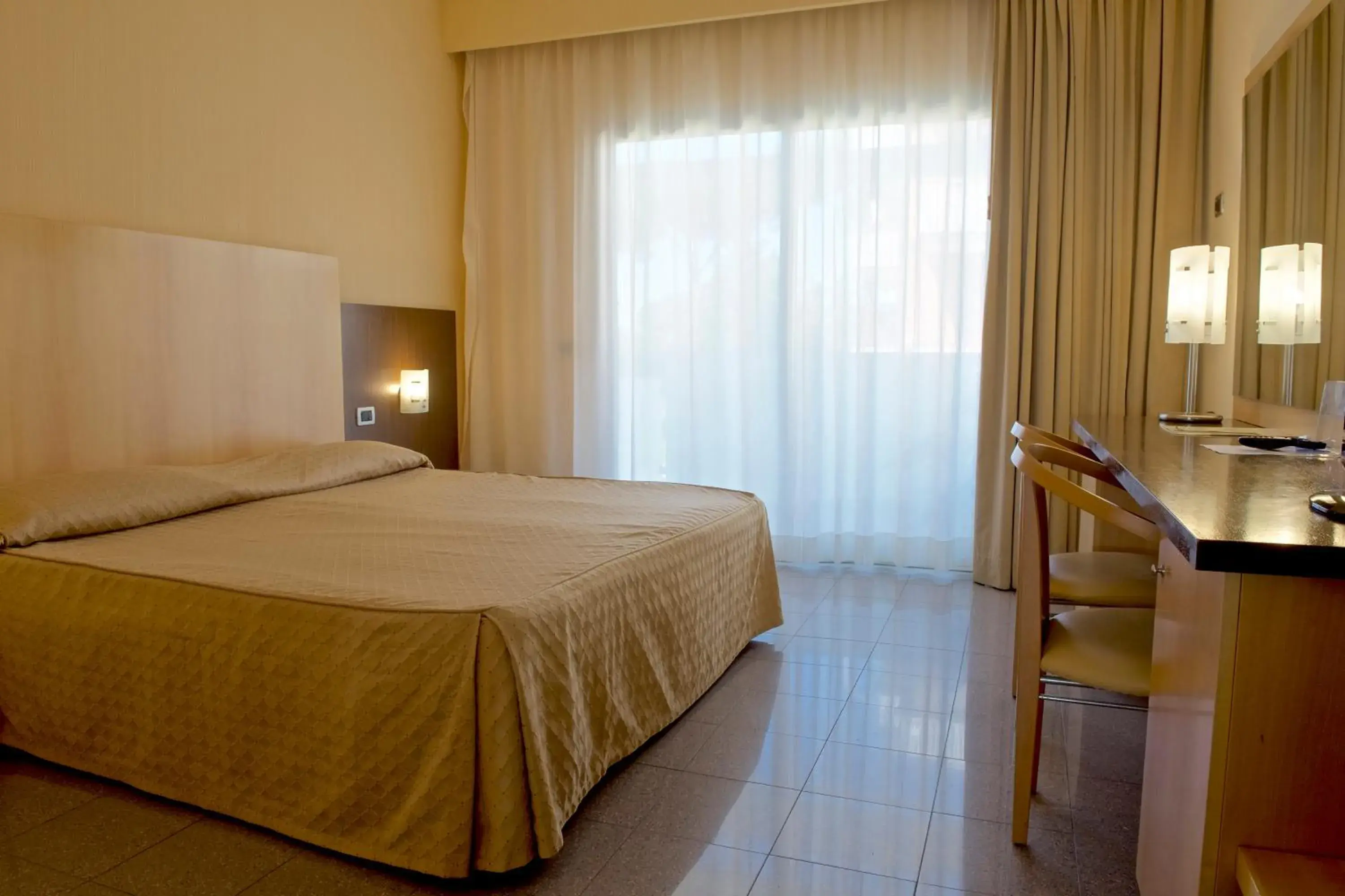 Bed in Albergo Mediterraneo