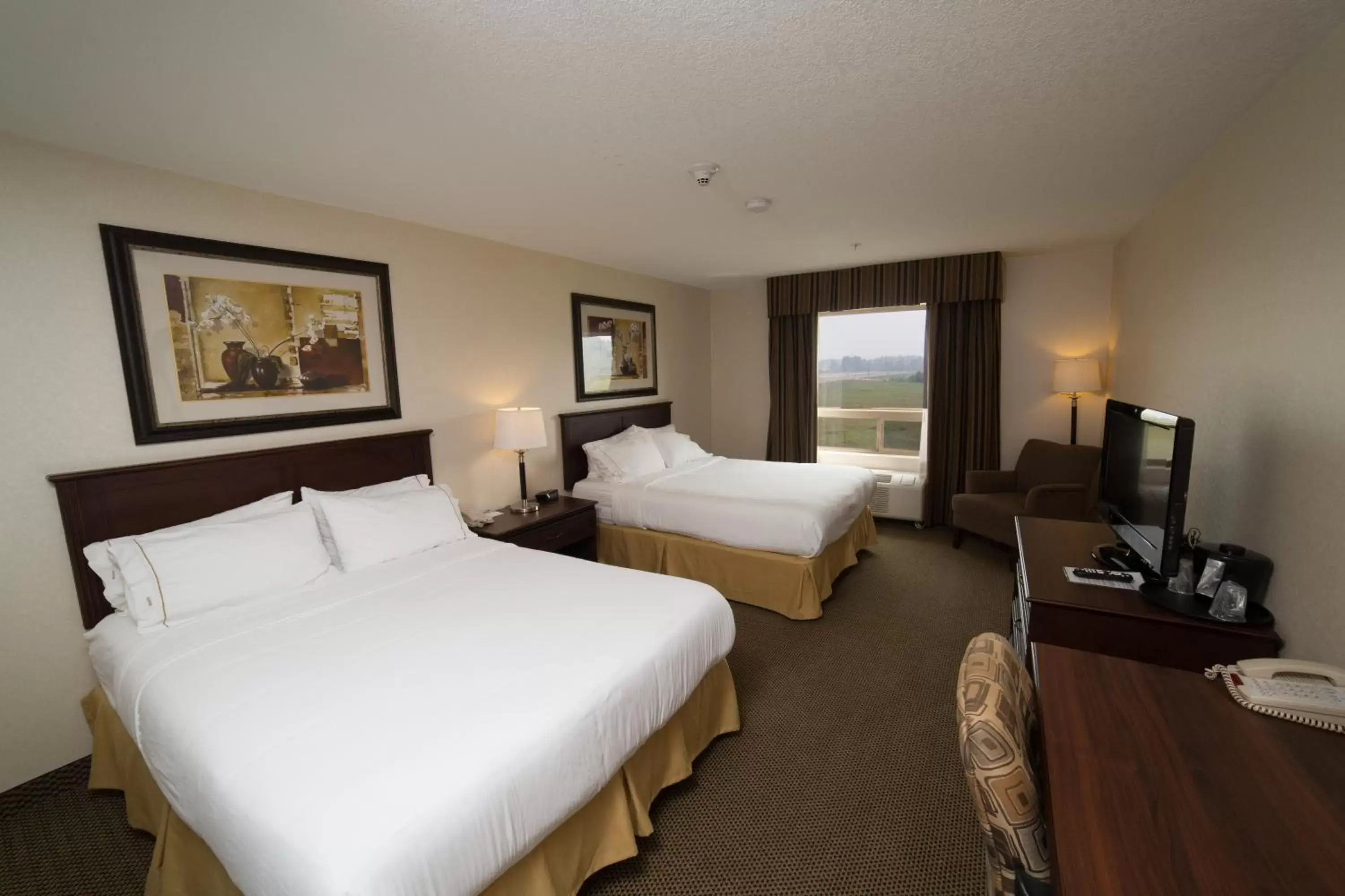 Bedroom in Holiday Inn Express & Suites Whitecourt, an IHG Hotel