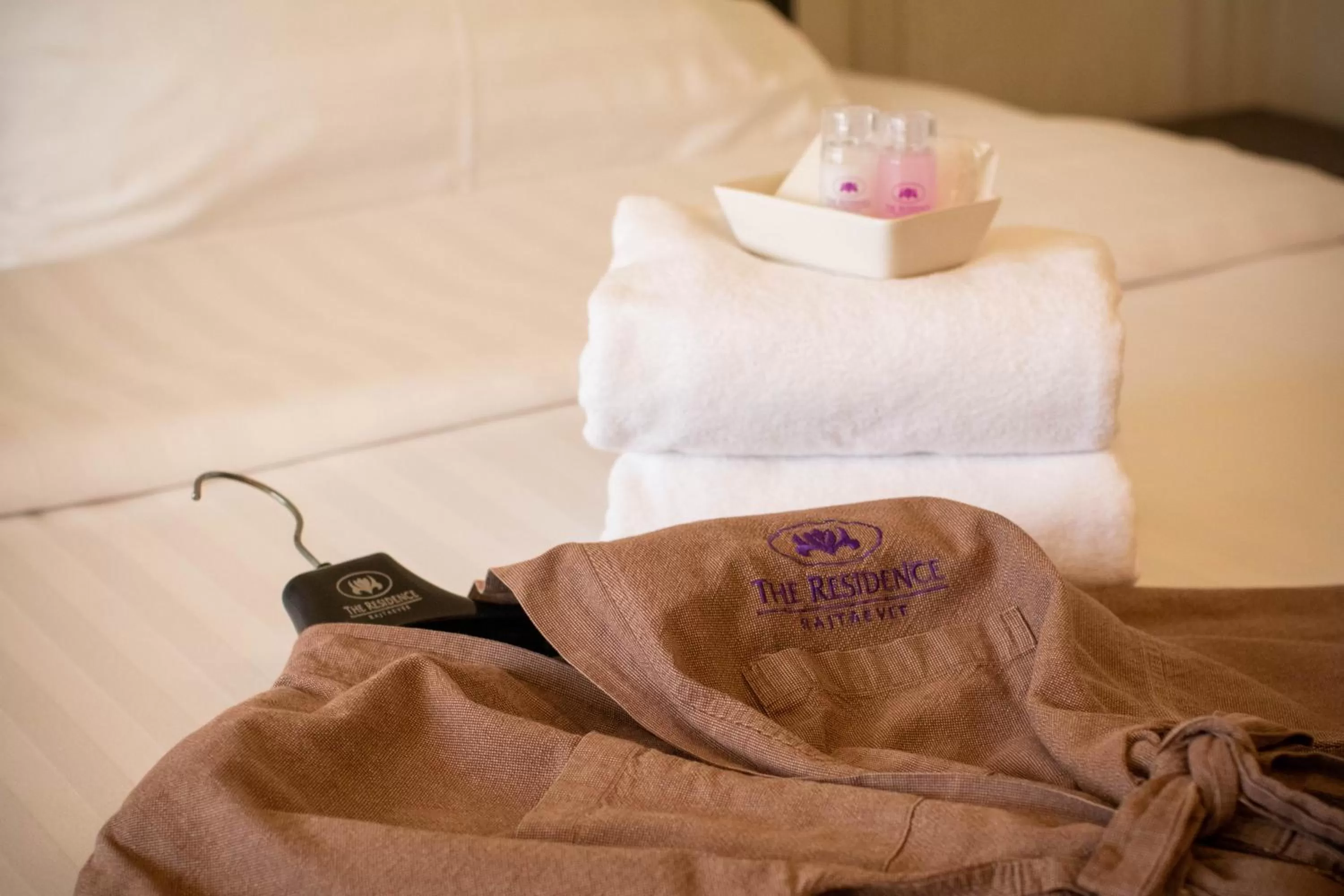 Bed in The Residence Rajtaevee Hotel