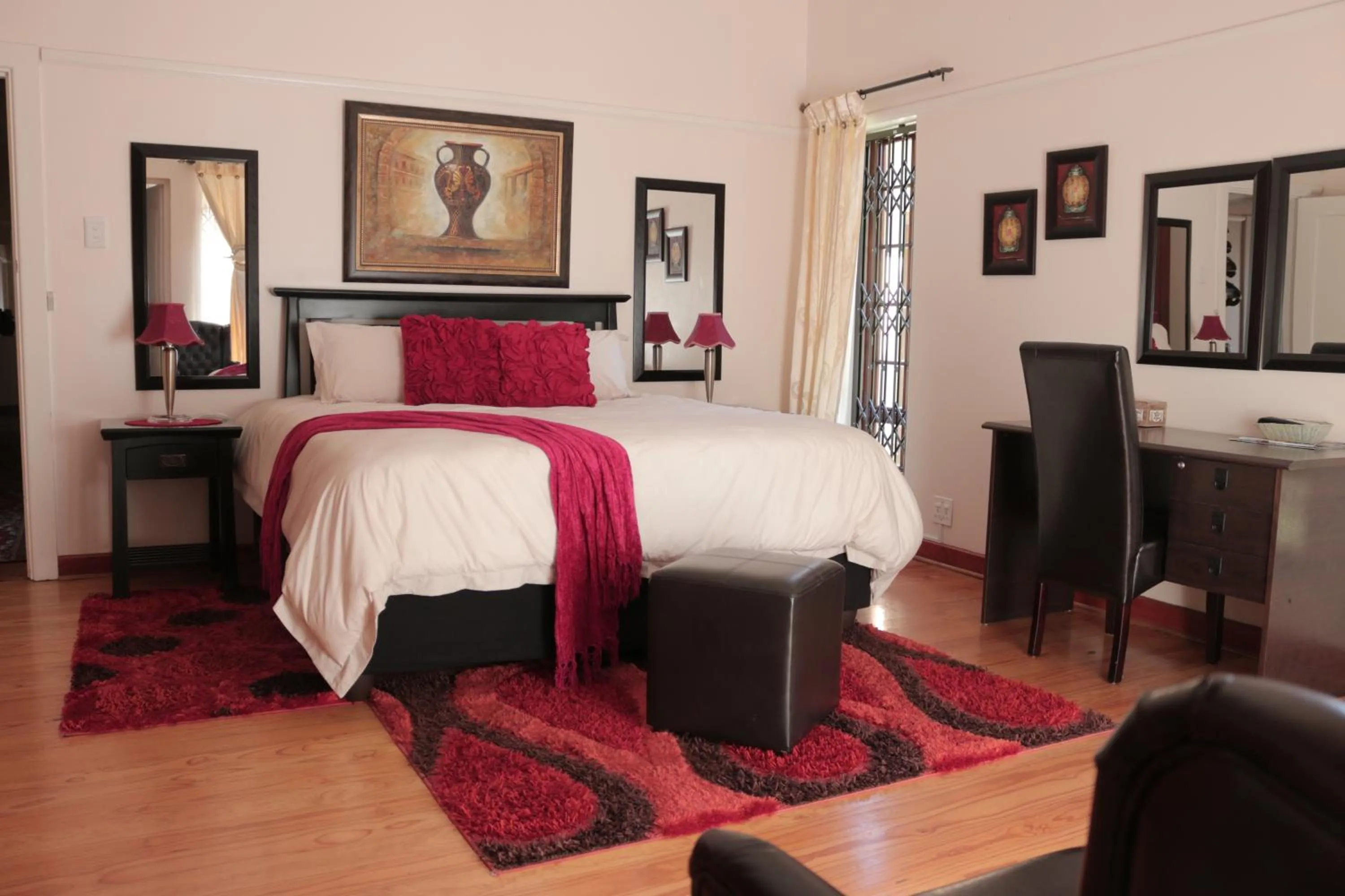 Bed in Rose Petals Guest House