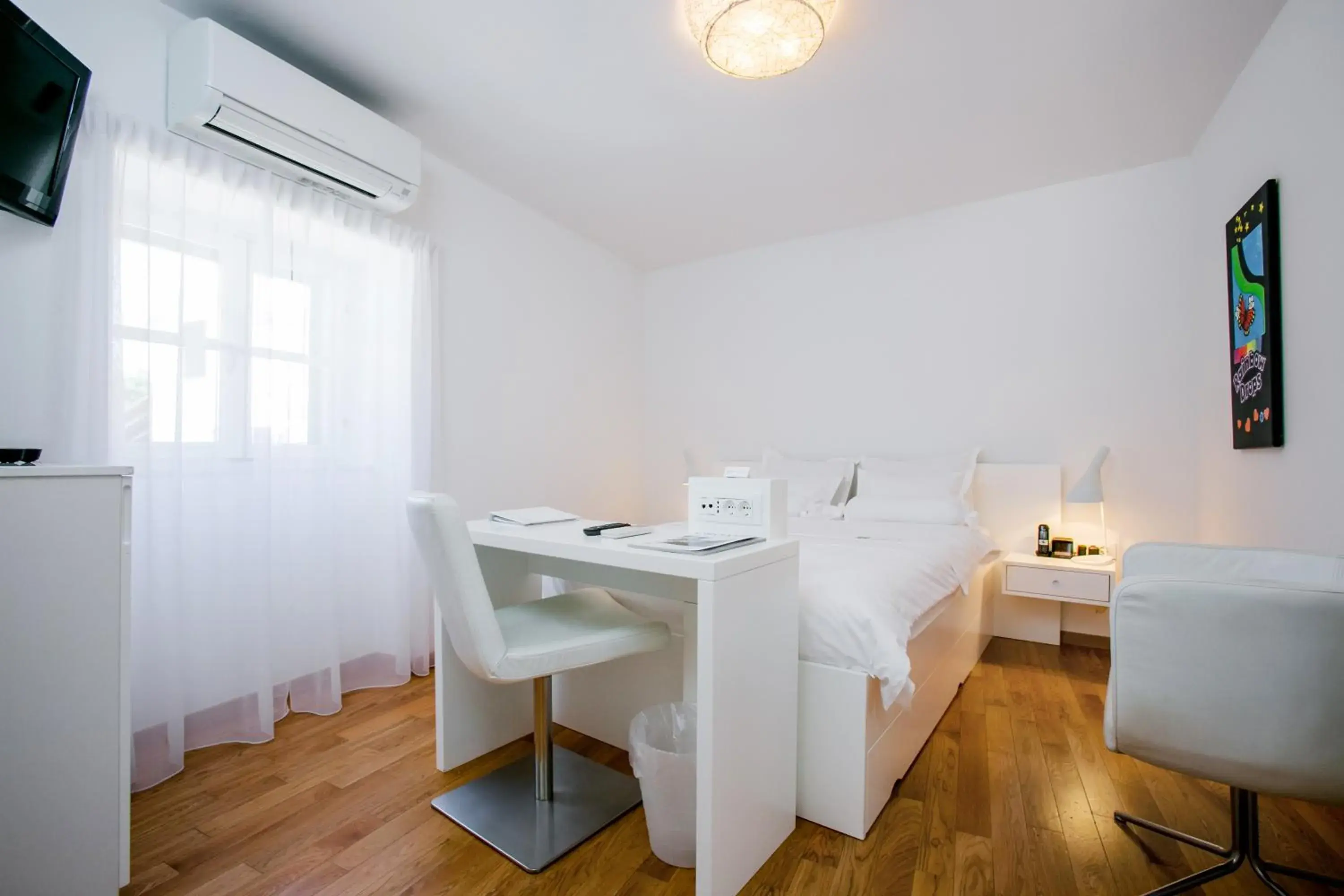 Bedroom, Dining Area in Divota Apartment Hotel