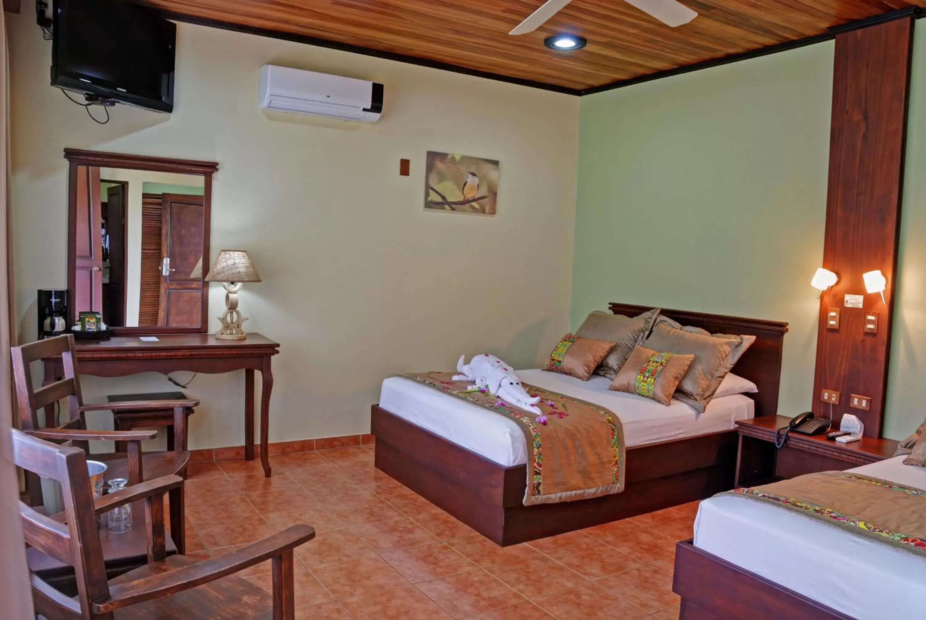 Photo of the whole room, Bed in Volcano Lodge, Hotel & Thermal Experience