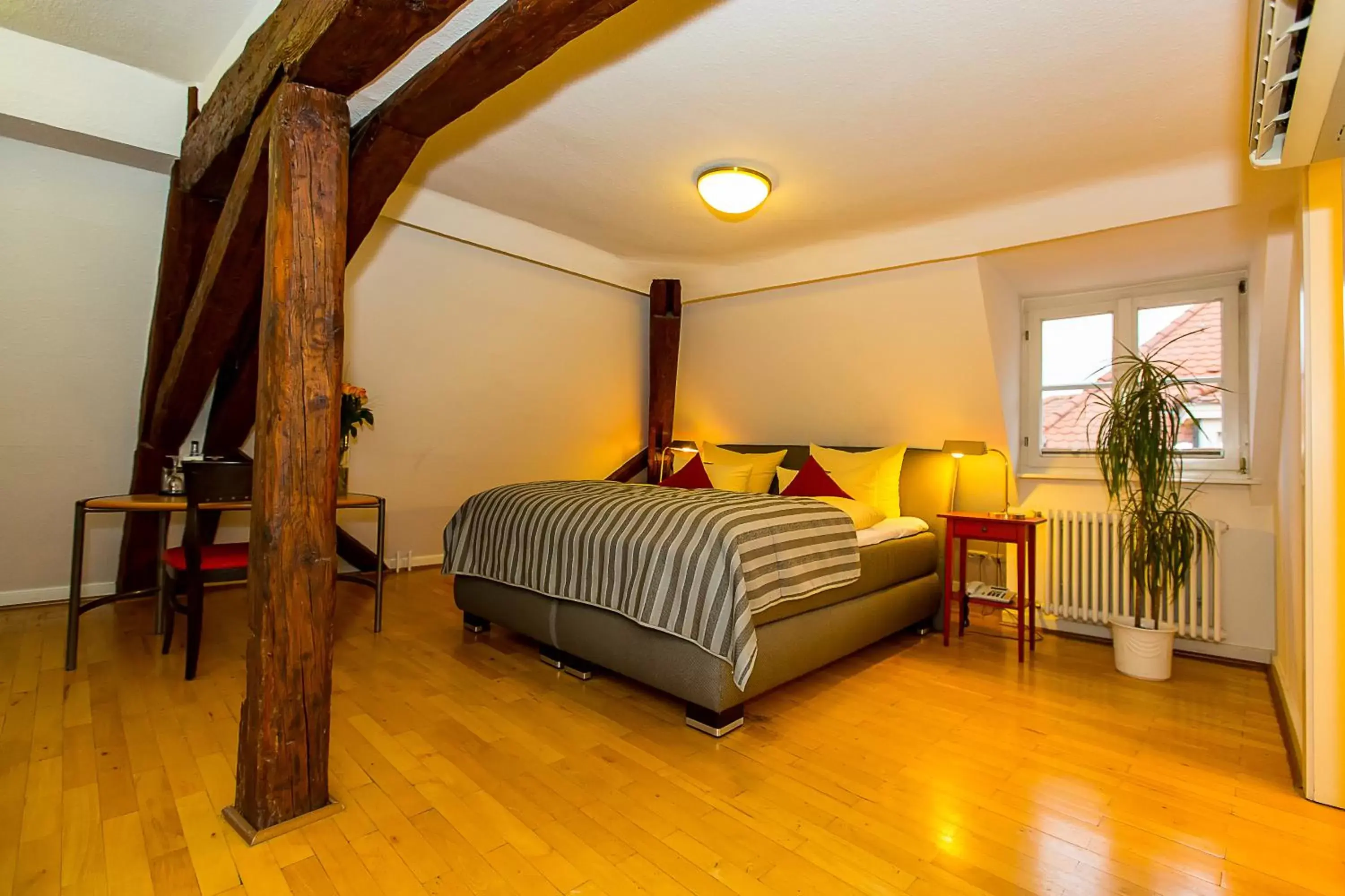 Seating area, Bed in Hotel Goldener Falke