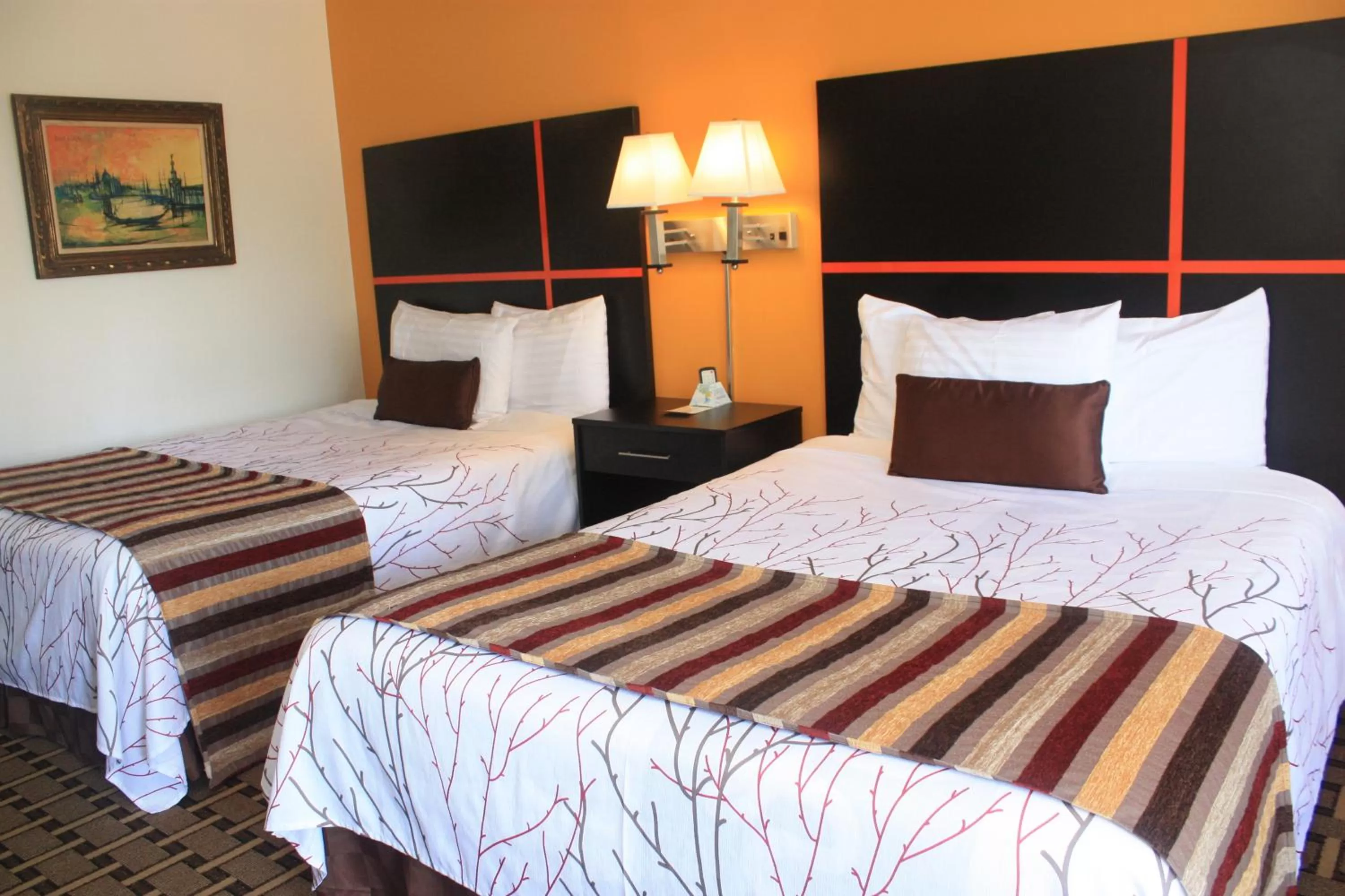 Bed in Chaparral Motor Inn