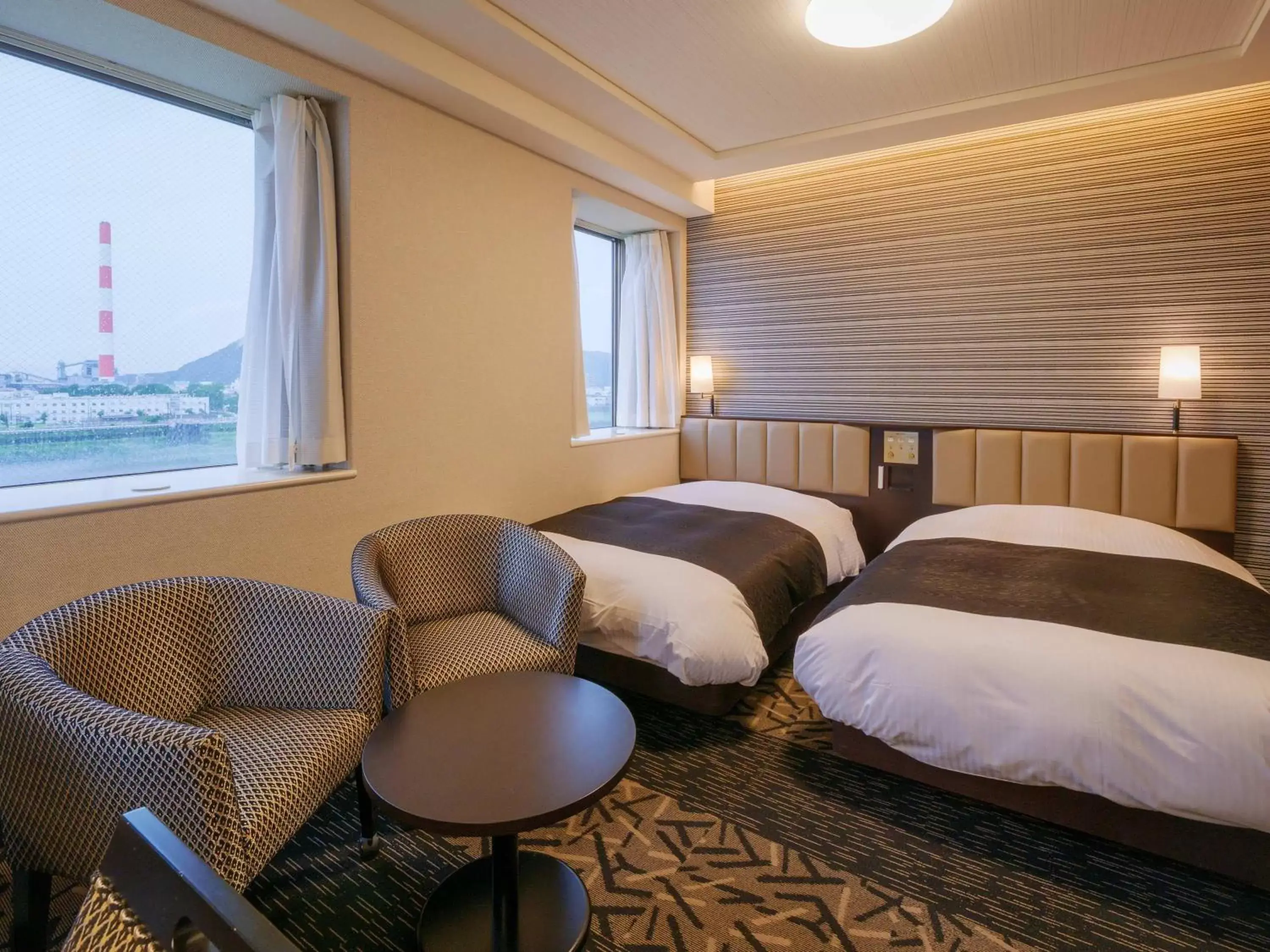 Photo of the whole room, Bed in APA Hotel Miyazaki Nobeoka Eki Minami