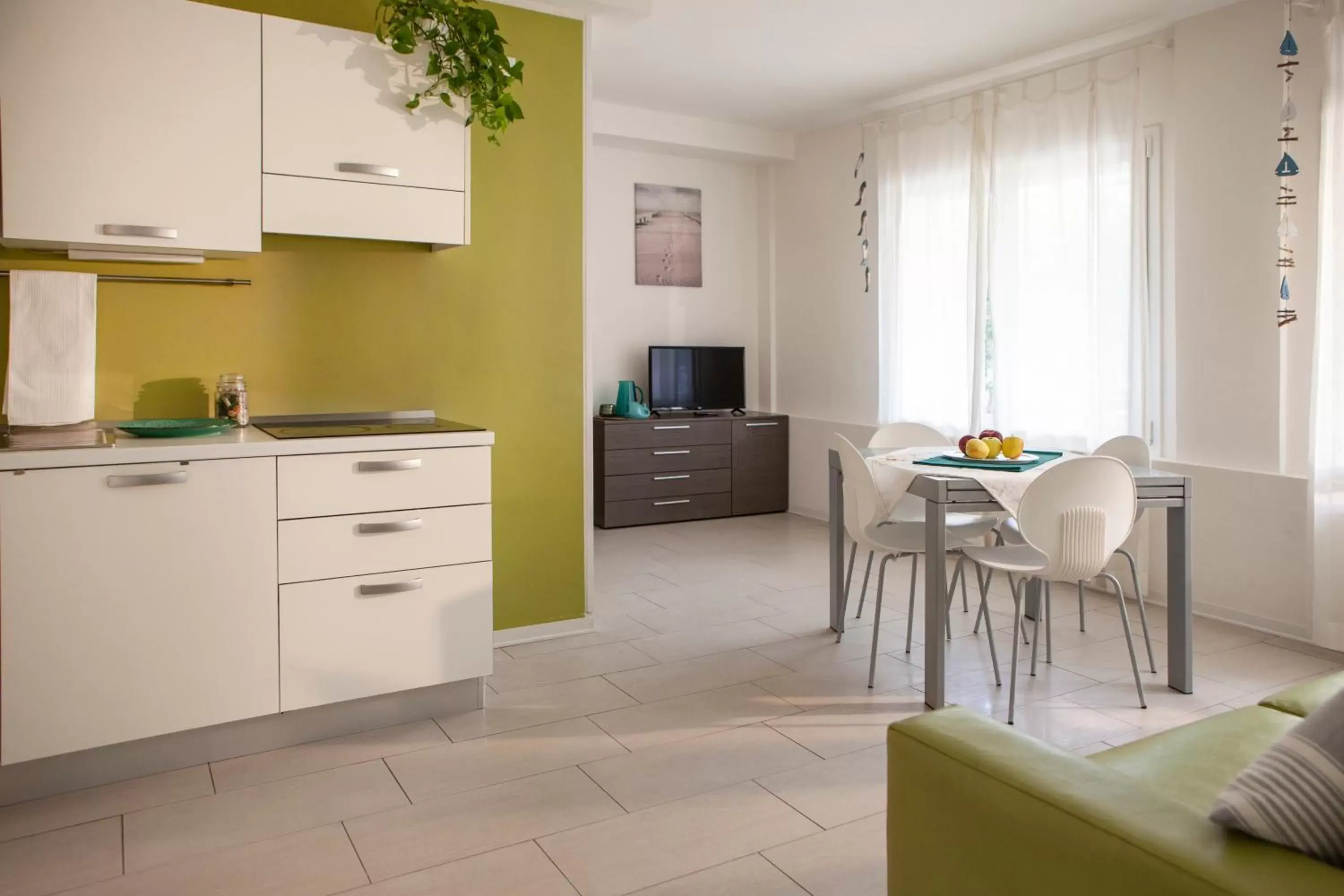 Living room, Kitchen/Kitchenette in Residence Sunrise Cesenatico