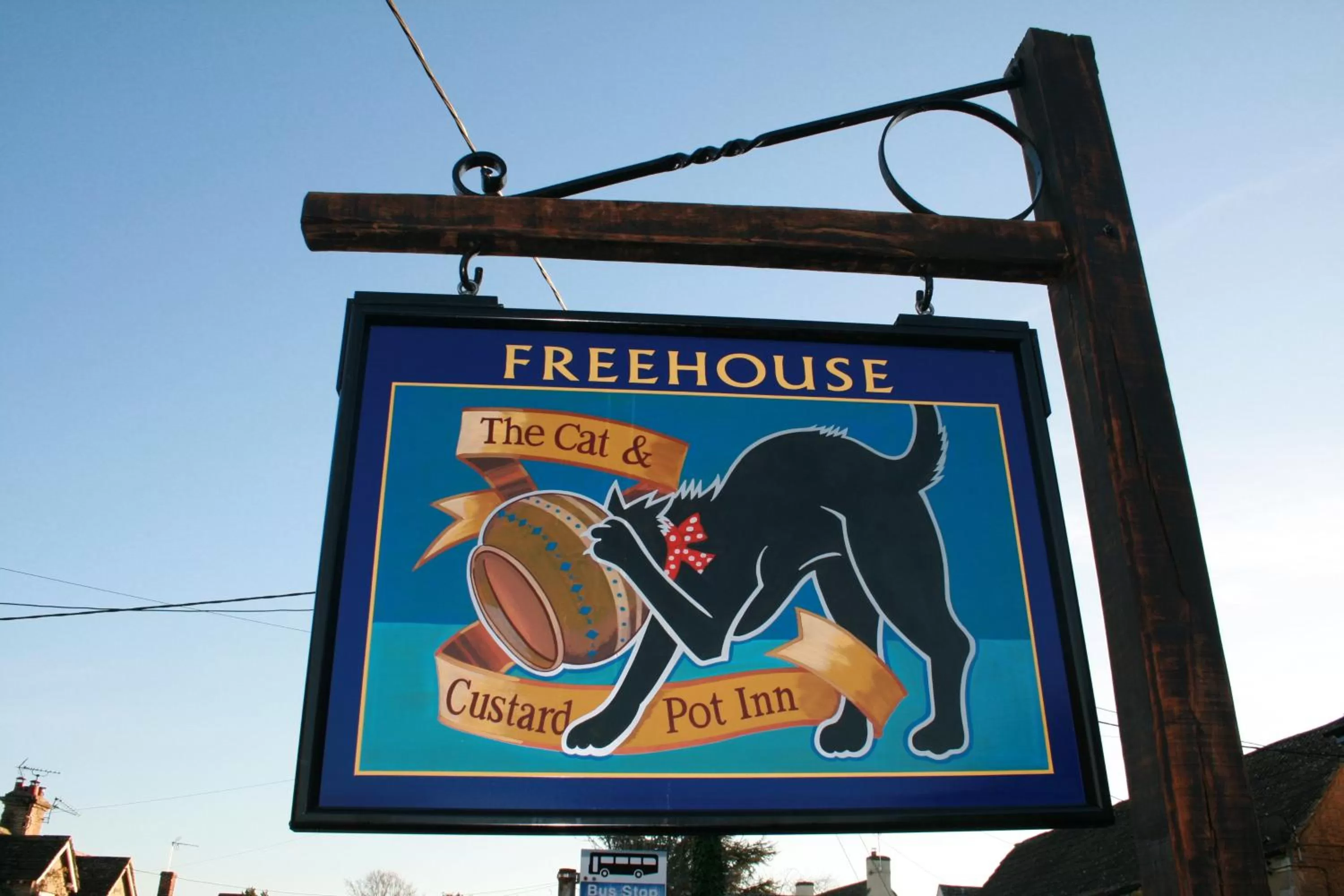 Property logo or sign in Cat and Custard Pot Inn