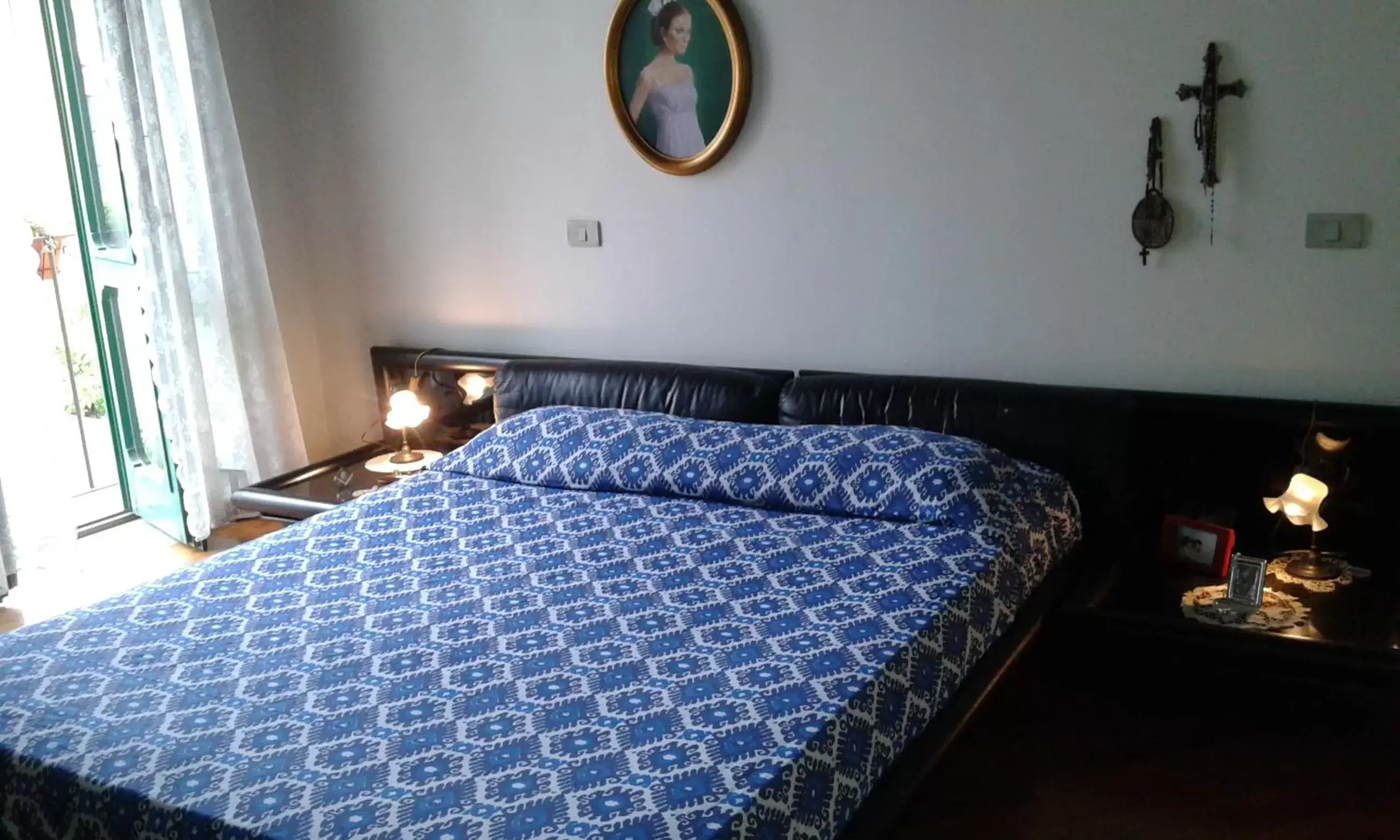 Photo of the whole room, Bed in In Via Roma