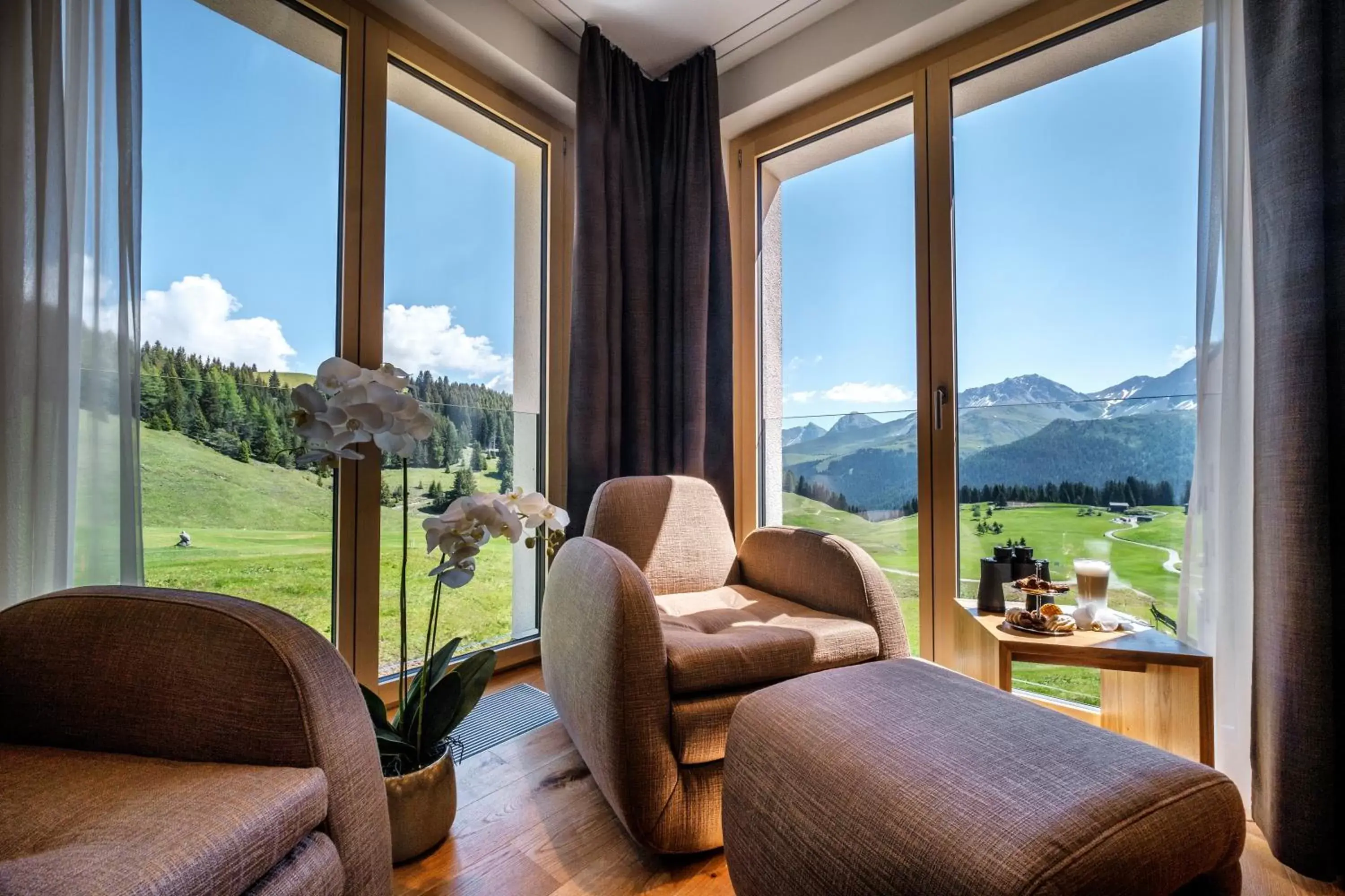 Living room, Mountain View in Golf- & Sporthotel Hof Maran