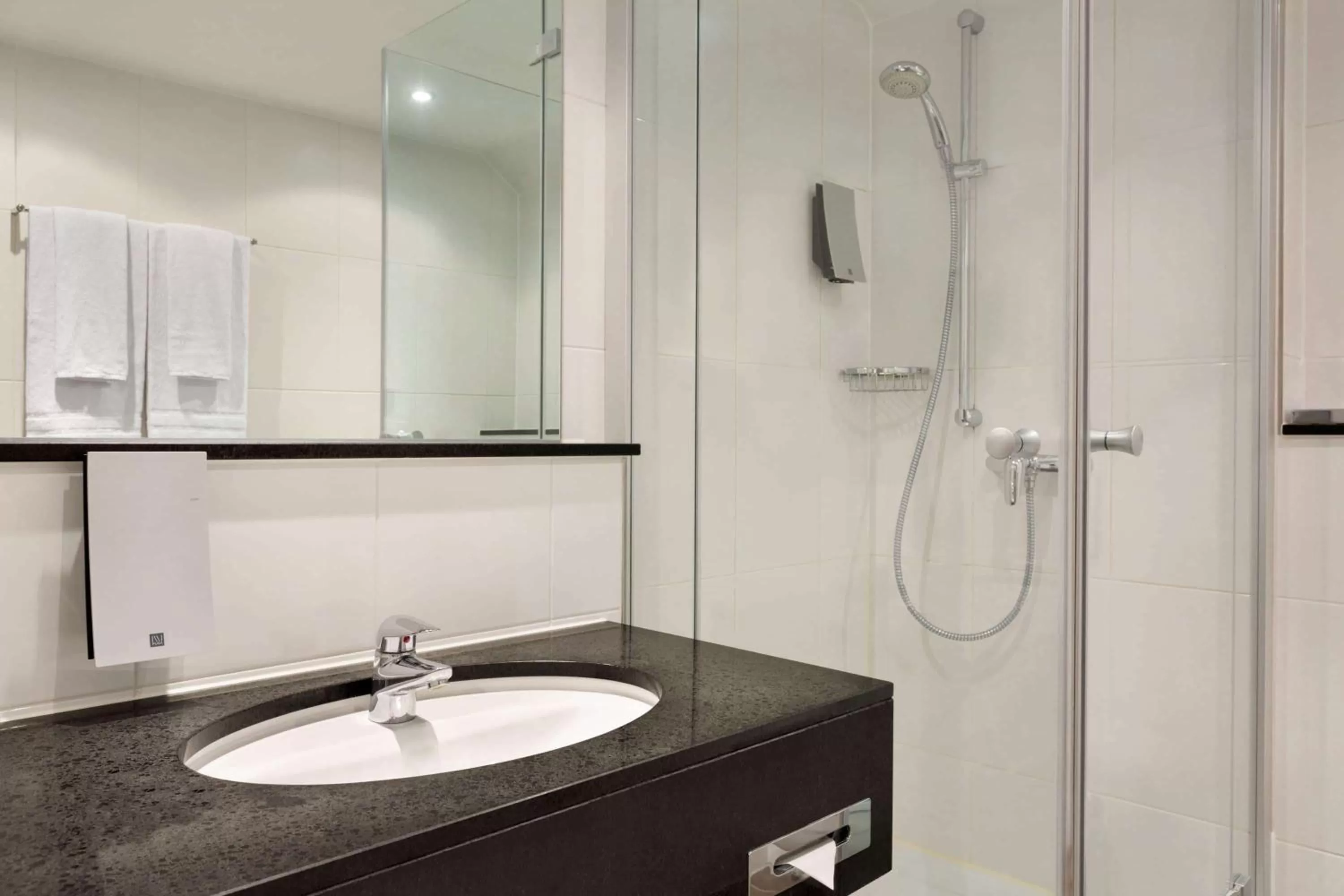 TV and multimedia in Ramada by Wyndham München Airport