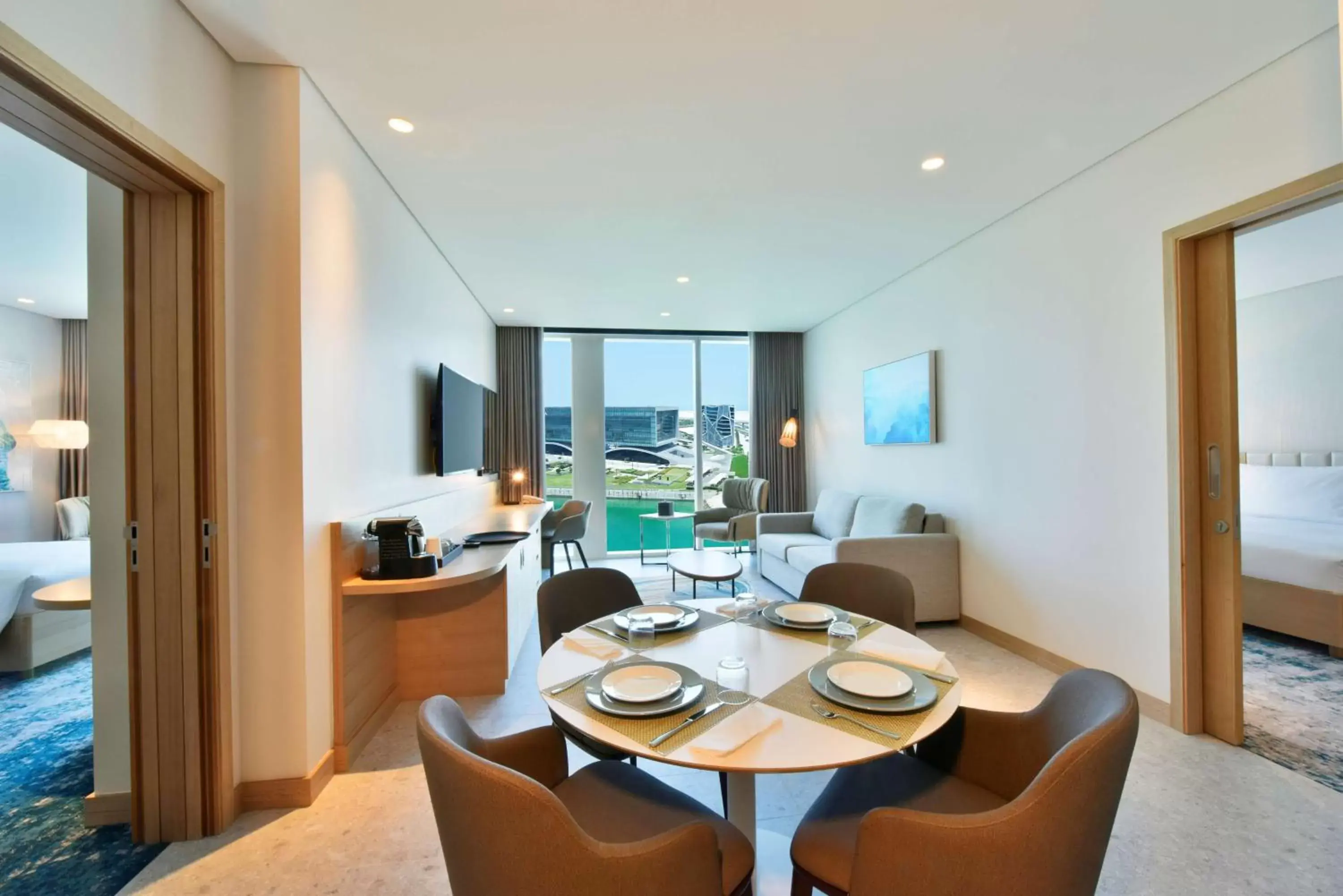 Bedroom, Dining Area in Hilton Garden Inn Bahrain Bay