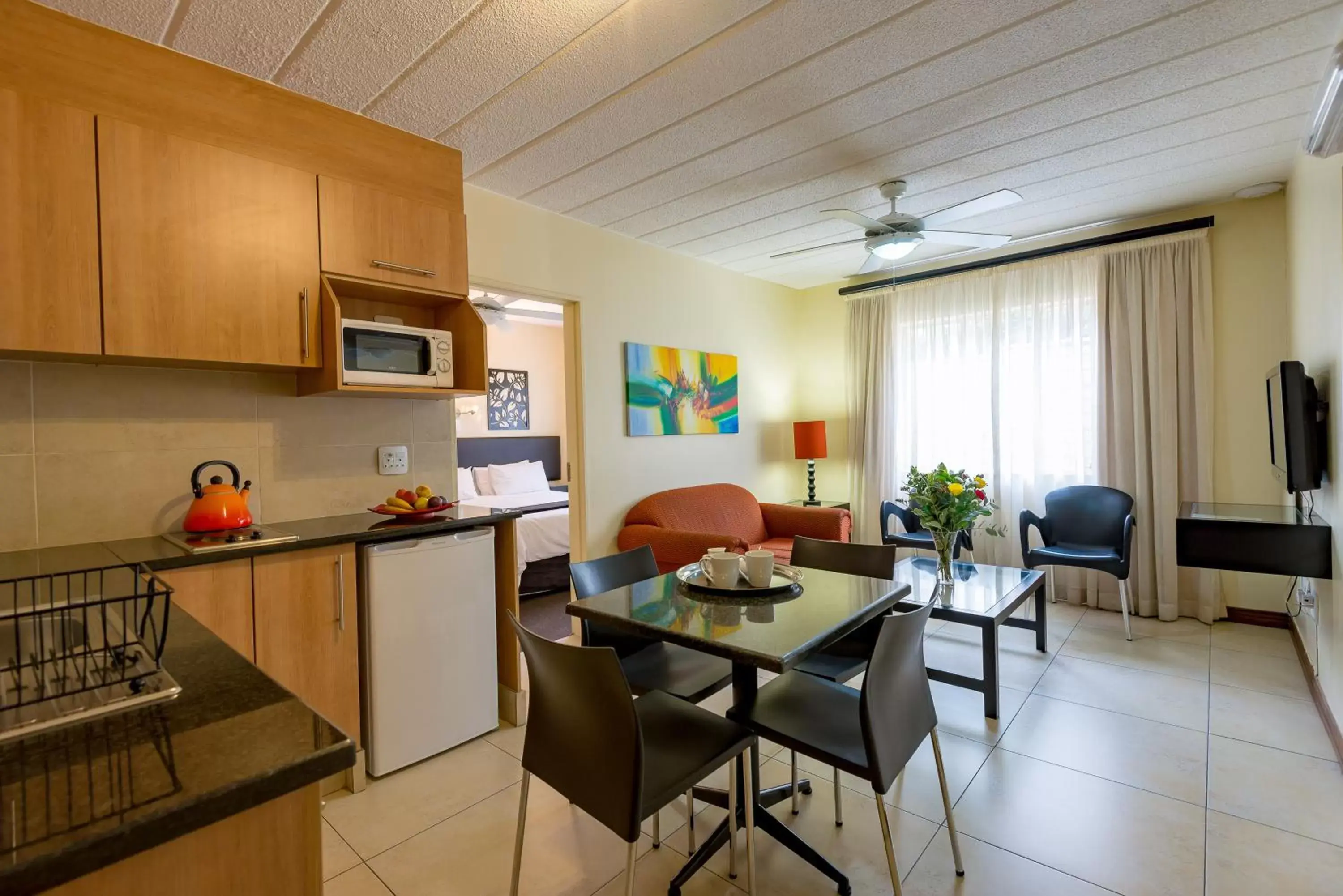 Kitchen or kitchenette, Dining Area in Premiere Classe Apartment Hotel