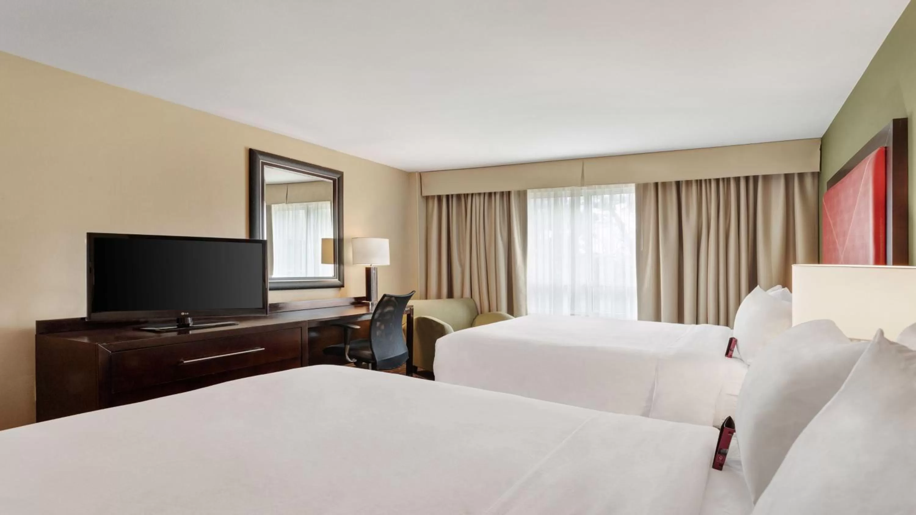Photo of the whole room, Bed in Crowne Plaza Houston Galleria Area by IHG