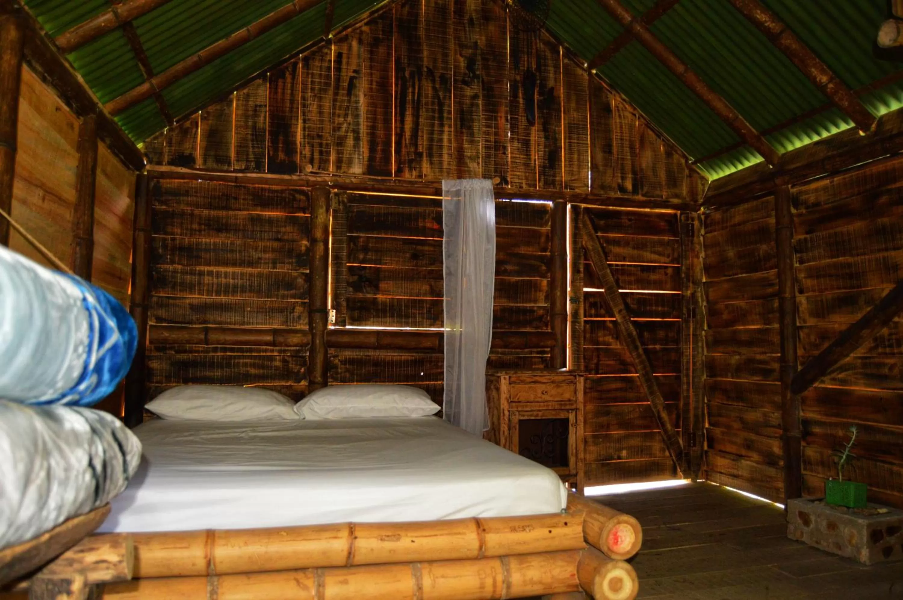 Bedroom, Bed in Cabañas Rústicas El Viejo Tambo By Rotamundos