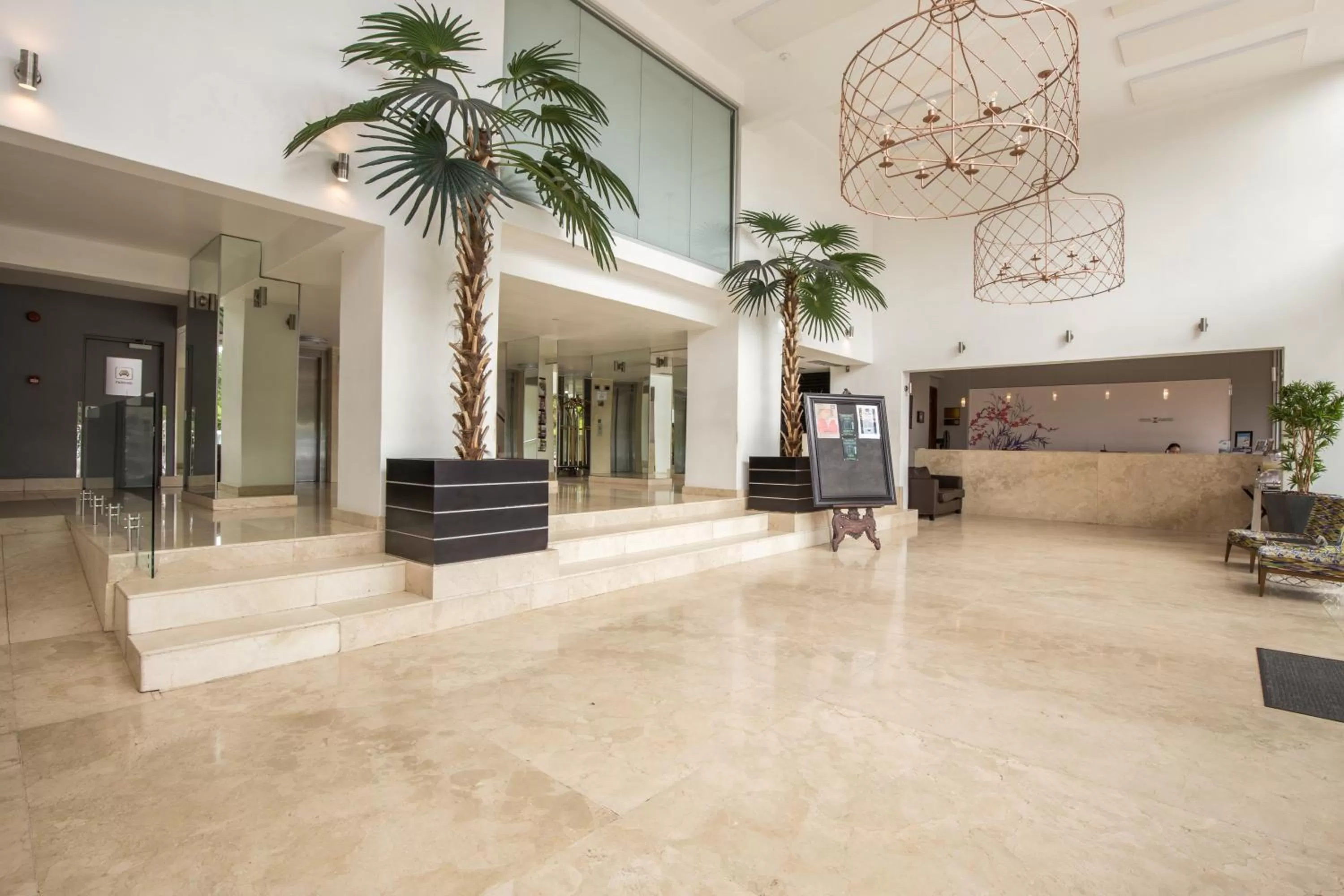 Lobby or reception in Belaire Suites Hotel