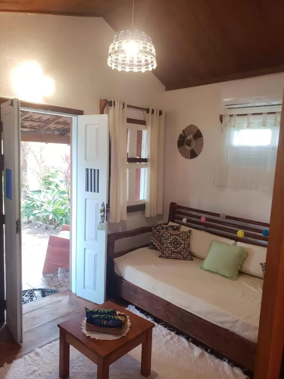 Living room, Bed in Pousada dos Hibiscus