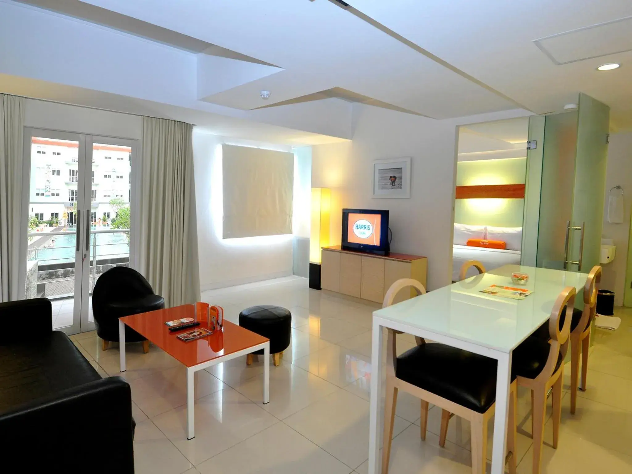 Communal lounge/ TV room in HOTEL and RESIDENCES Riverview Kuta - Bali (Associated HARRIS)