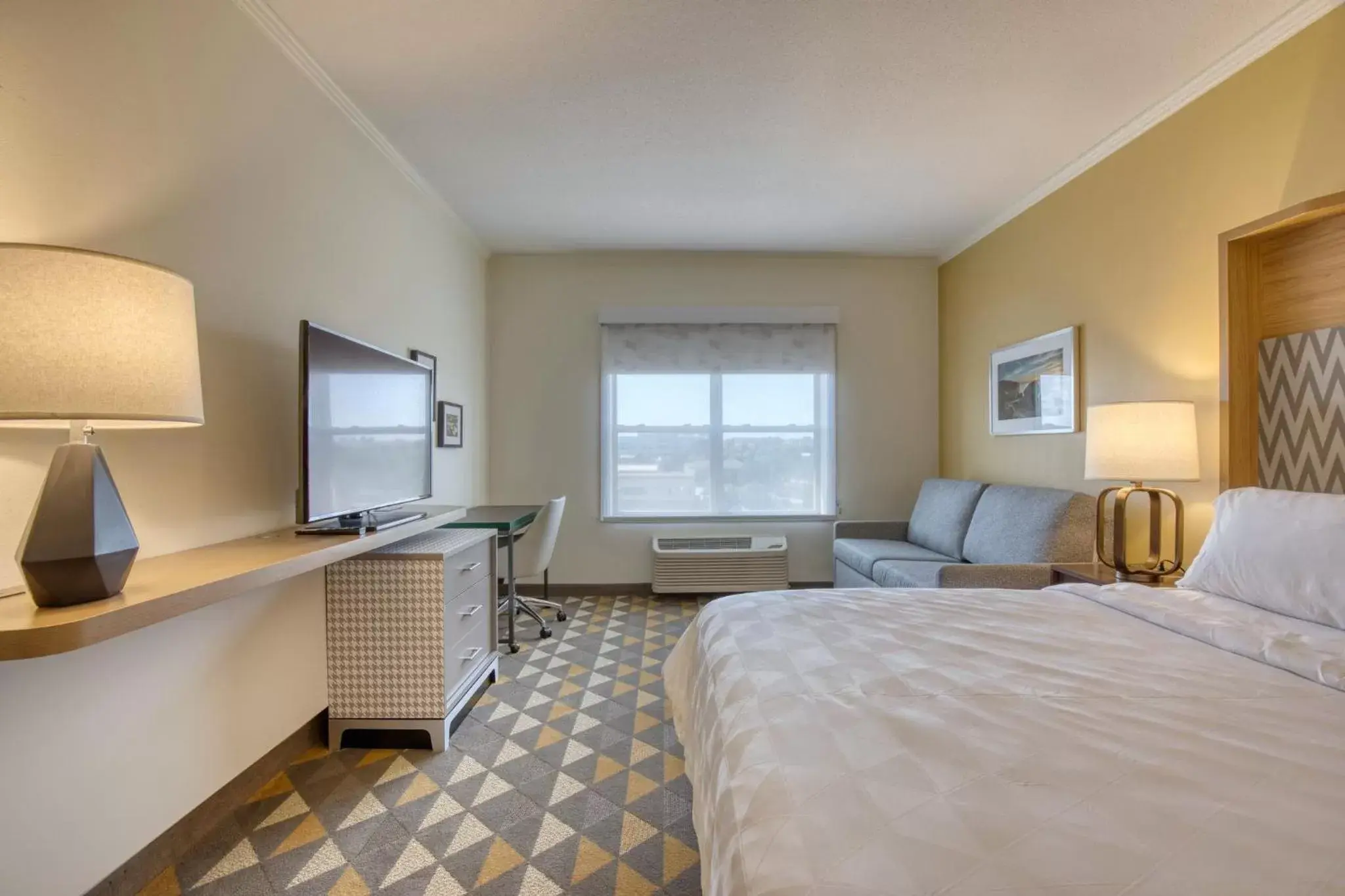 Photo of the whole room, TV/Entertainment Center in Holiday Inn Hotel & Suites Madison West, an IHG Hotel