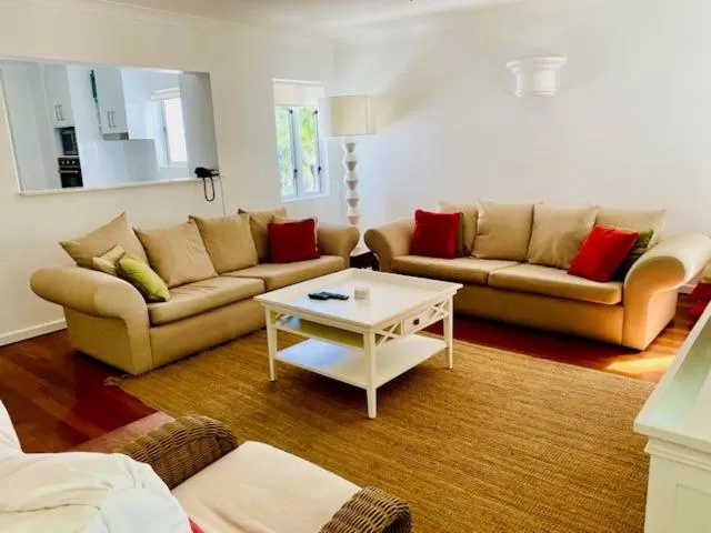 Living room in BeachView Apartments at Villa Paradiso