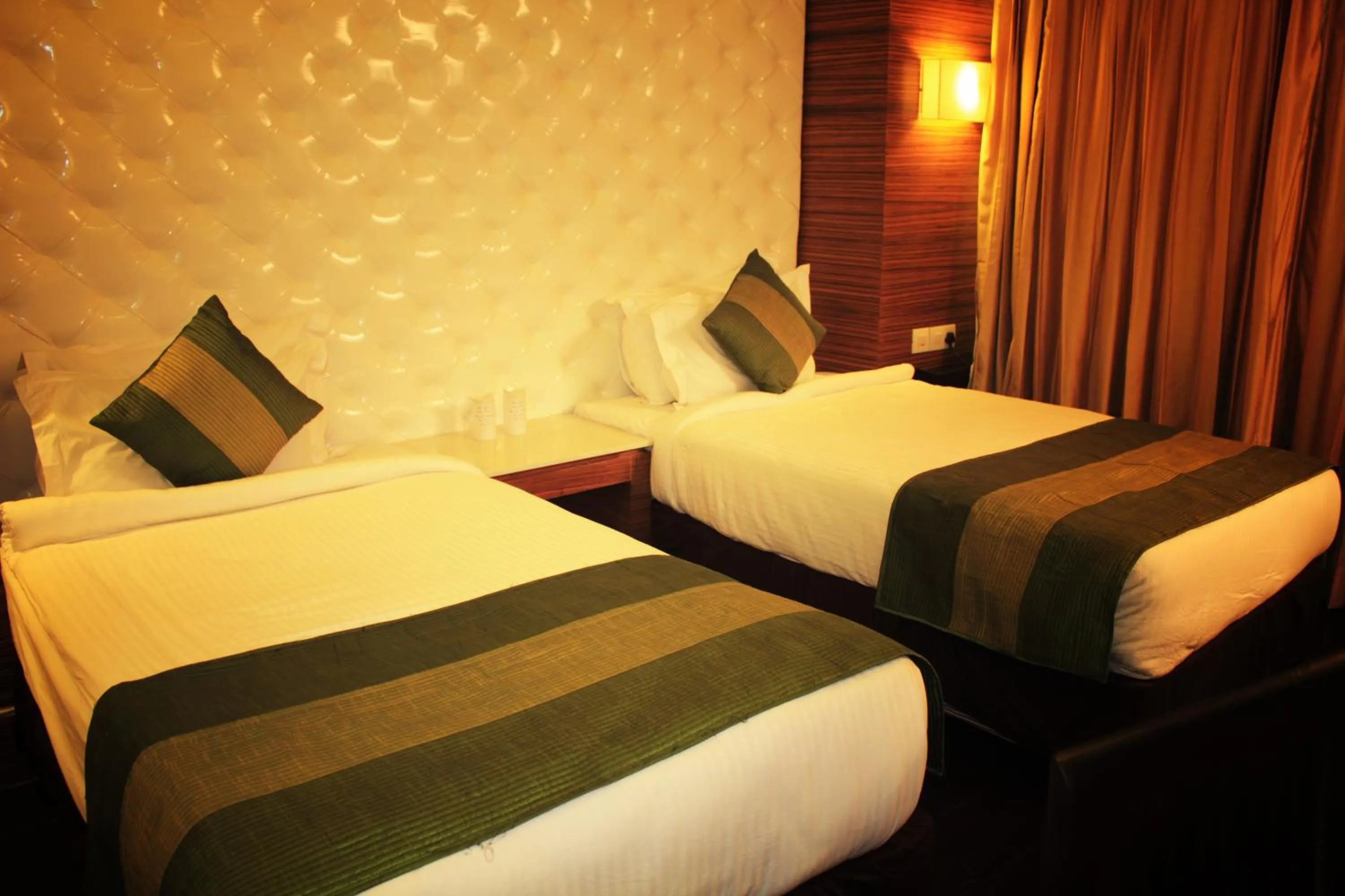 Bed in Hotel Ivory 32