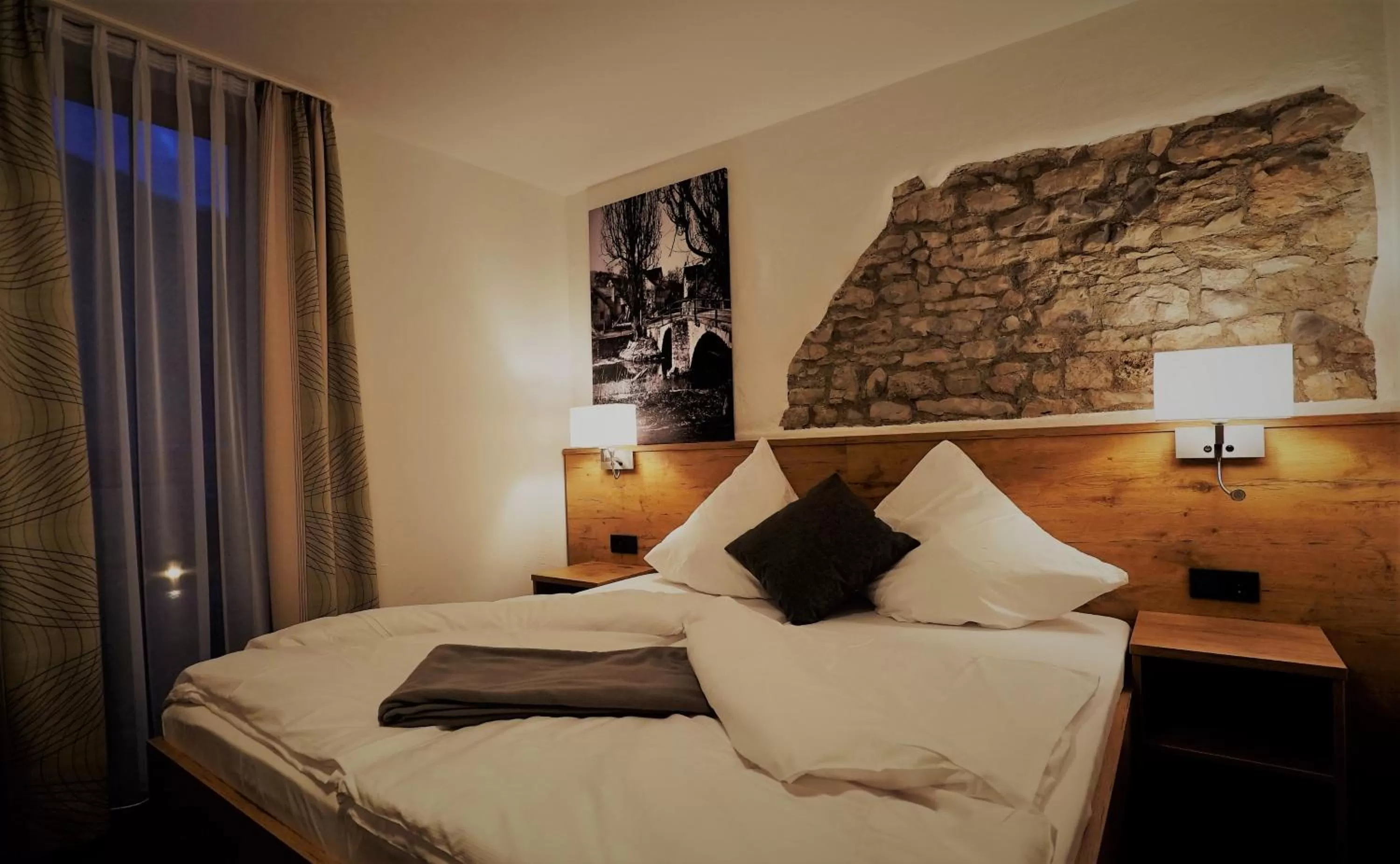 Bed in Kelterhotel Fröscher