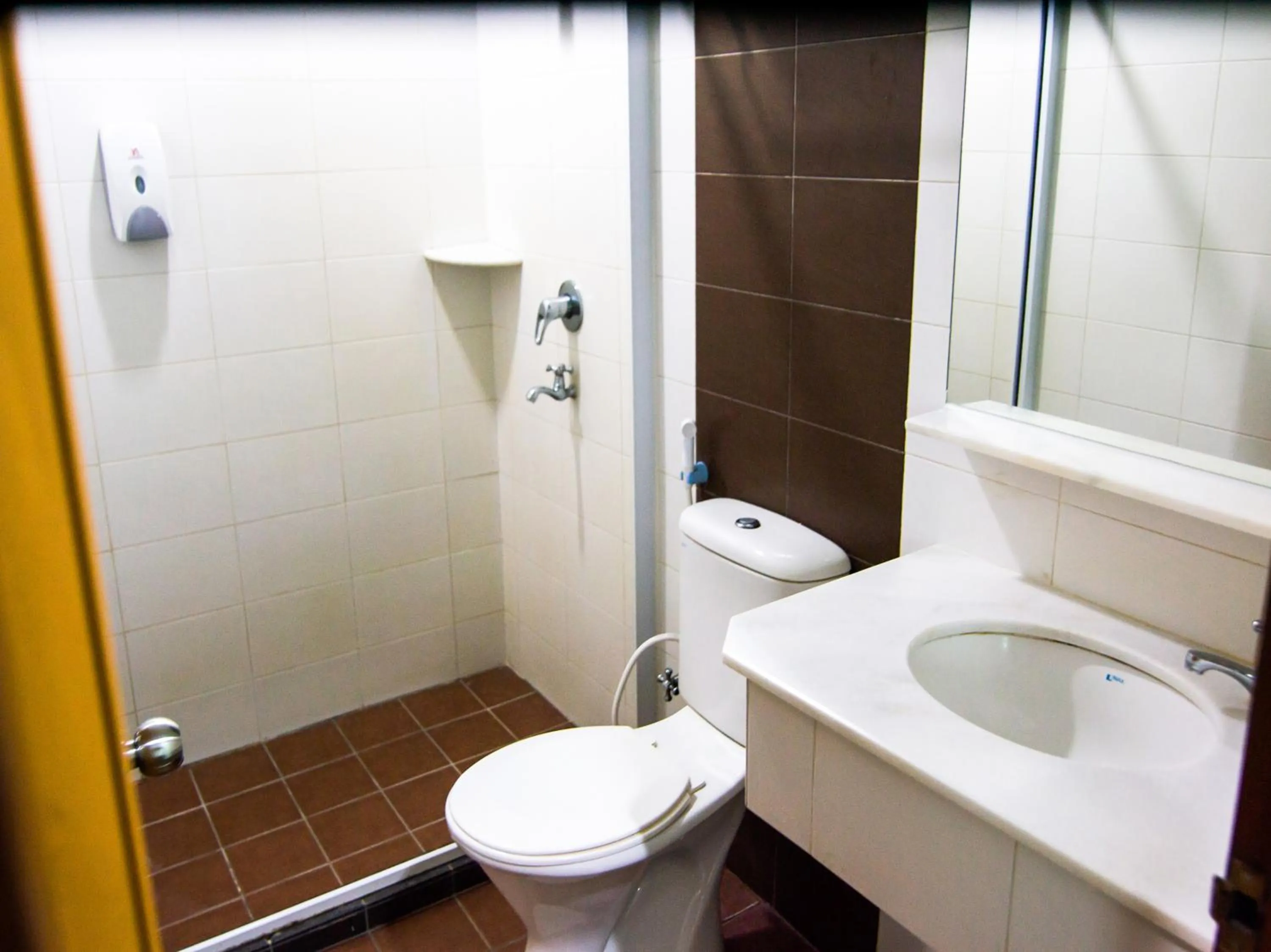 Bathroom in OYO 89408 Royal Hotel