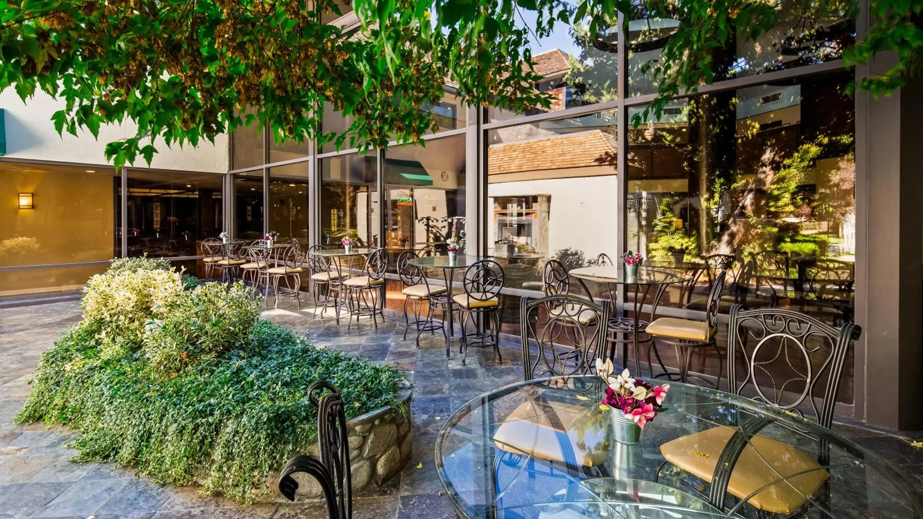 Balcony/Terrace, Swimming Pool in SureStay Plus Hotel by Best Western Reno Airport