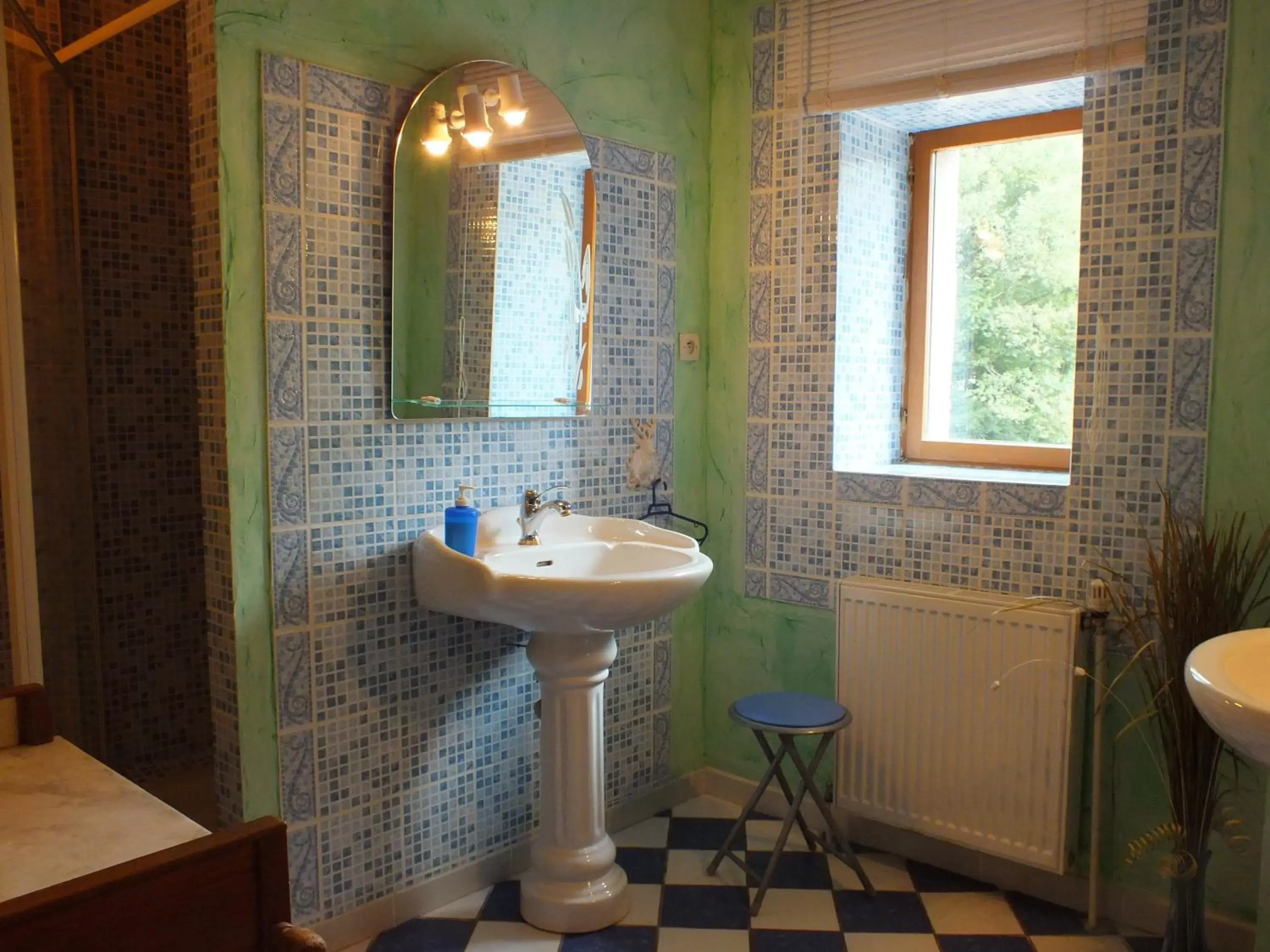 Bathroom in Chambres d'hôtes La Charmante