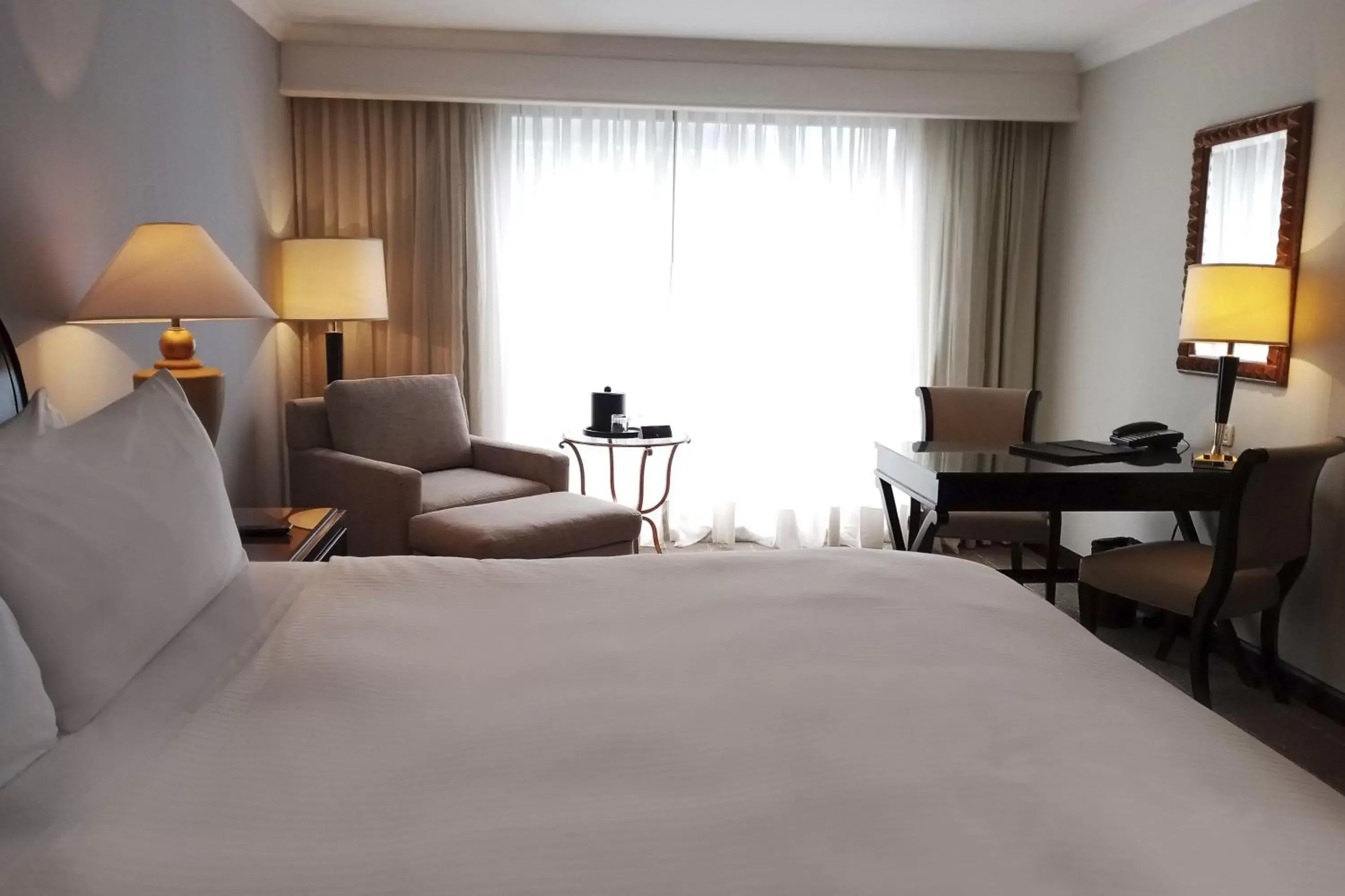 Photo of the whole room, Bed in JW Marriott Caracas