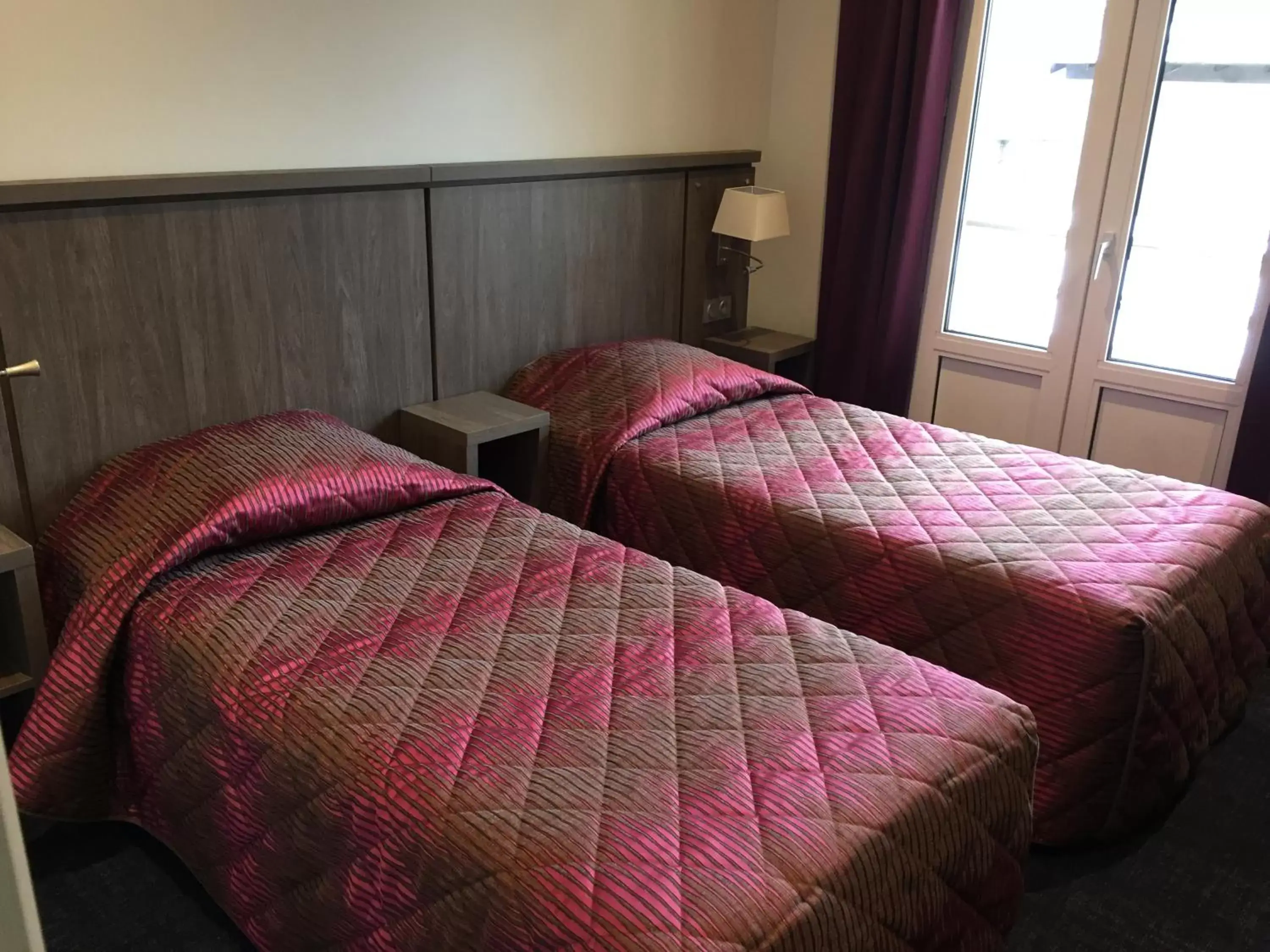 Photo of the whole room, Bed in Hôtel Mont-Brison