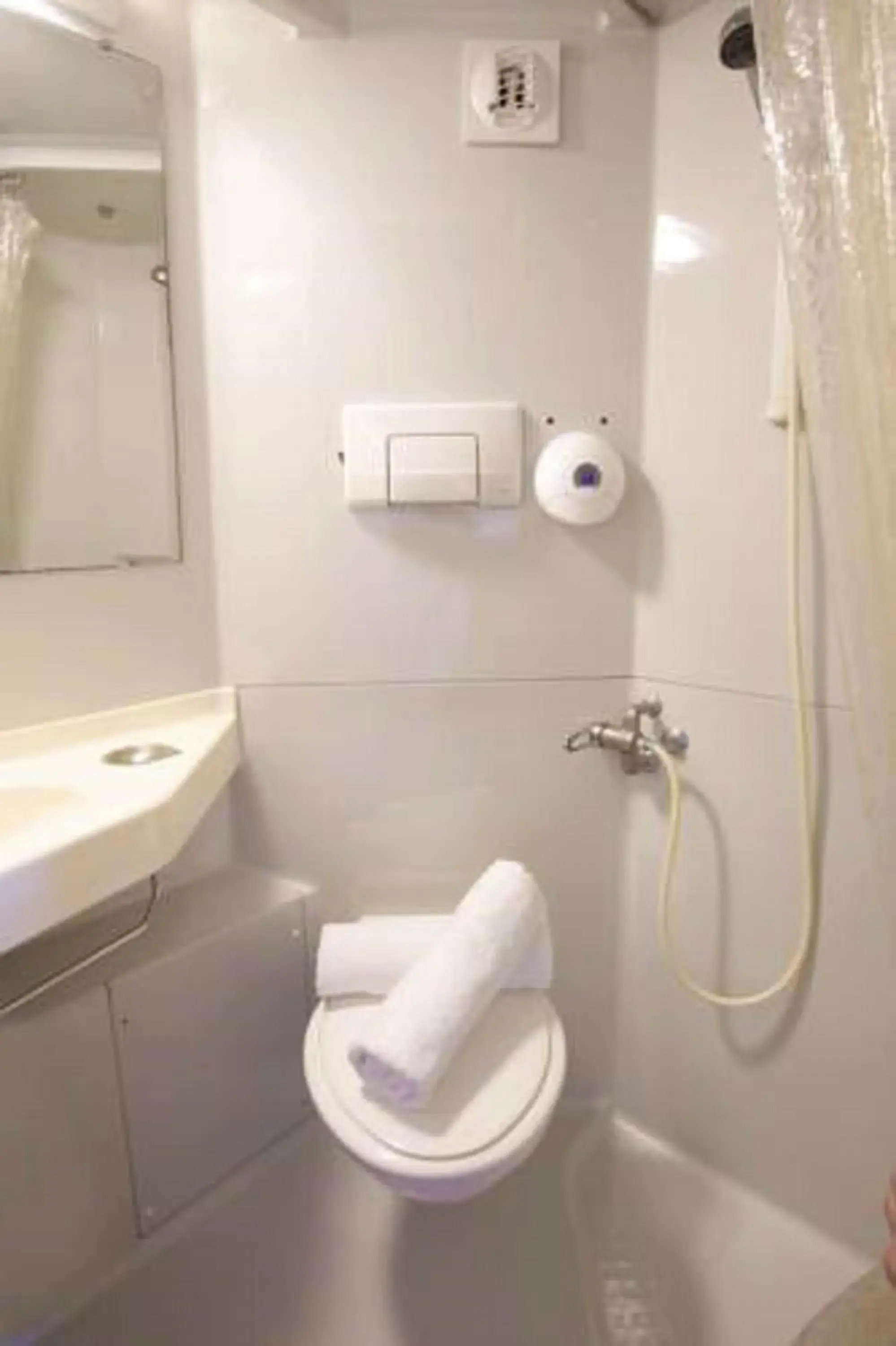 Bathroom in Premiere Classe Paris Ouest - Pont de Suresnes Hotel