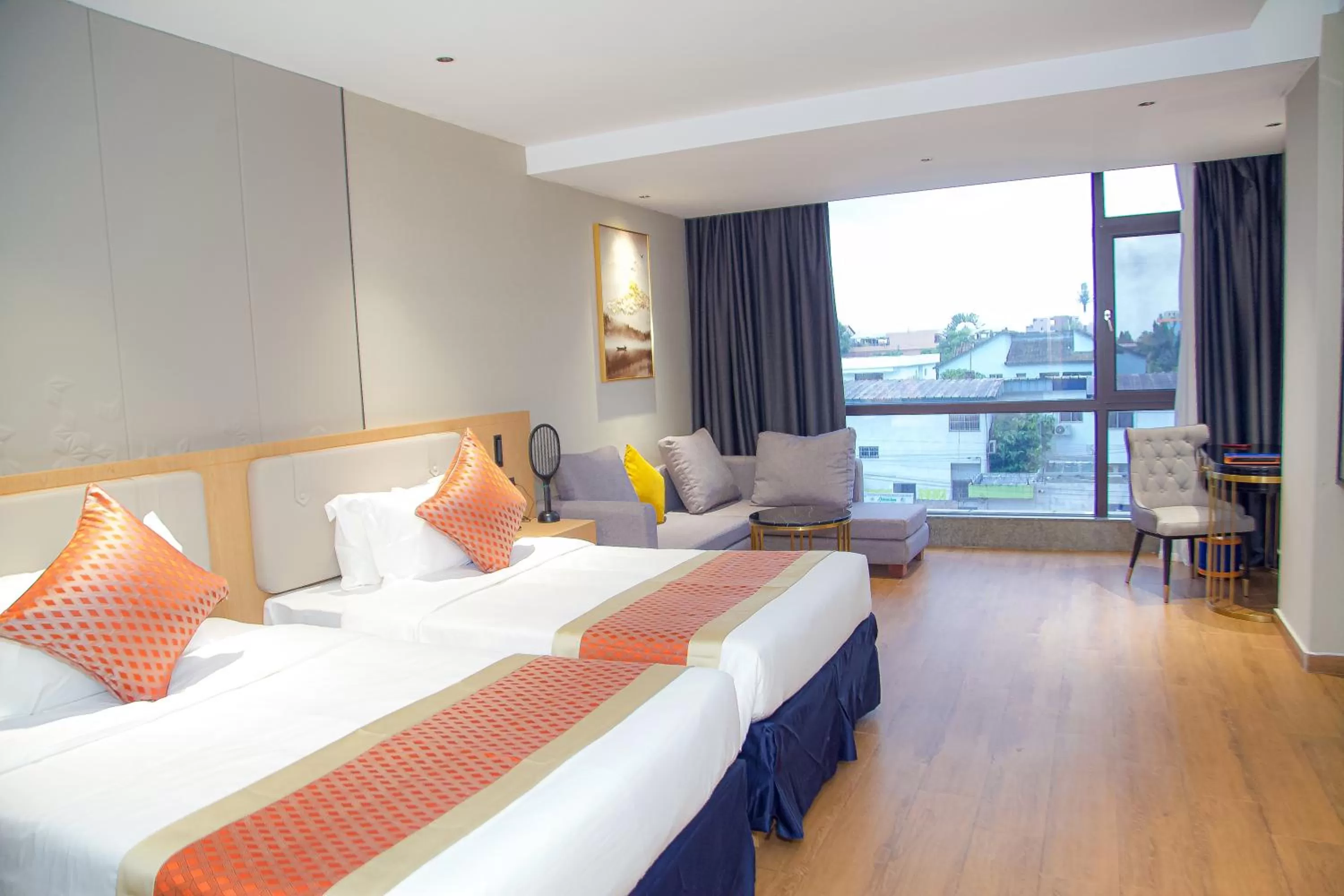 Photo of the whole room in Hôtel FAMILLE MONDIALE