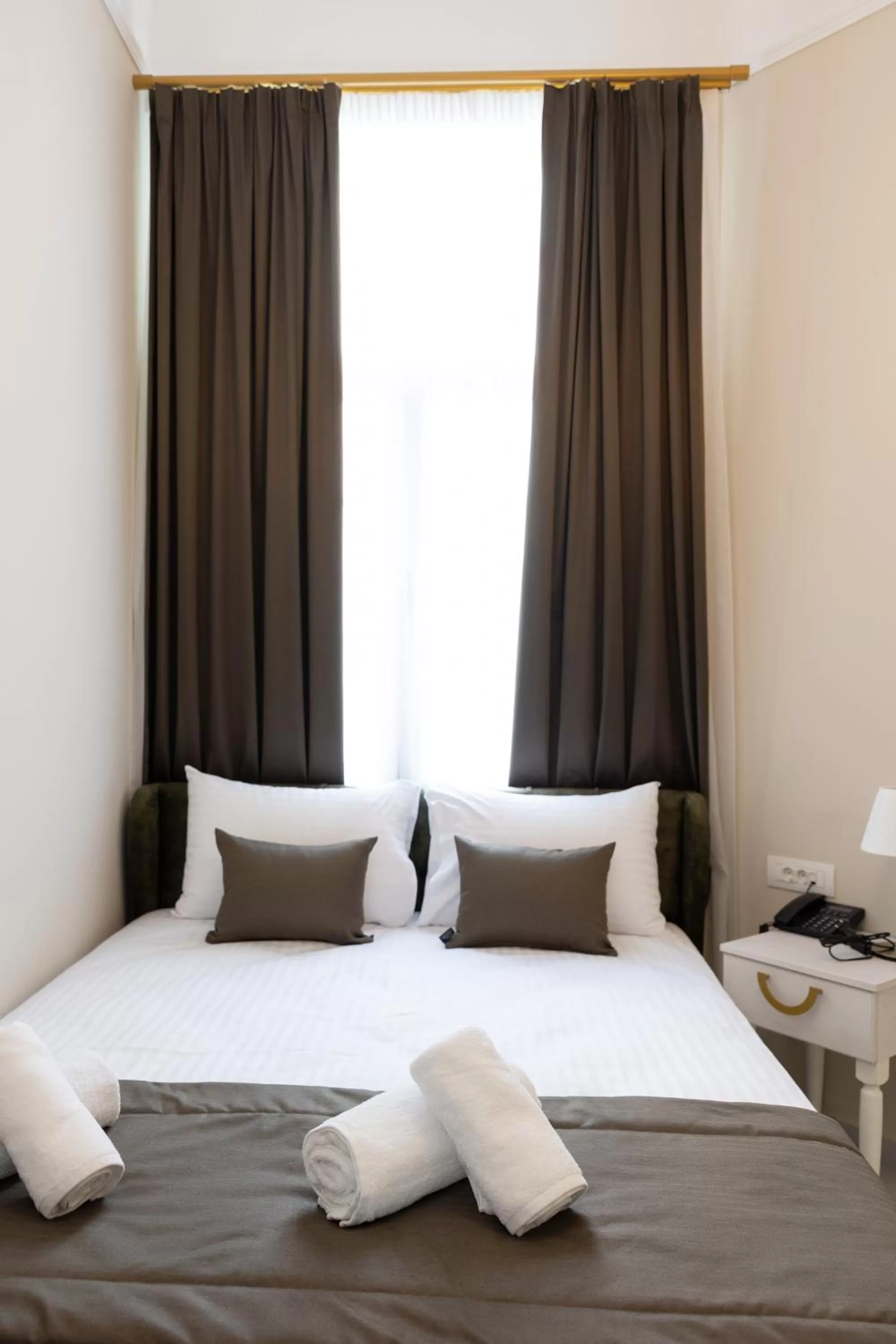 Bed in Modern Revival Luxury Hotel