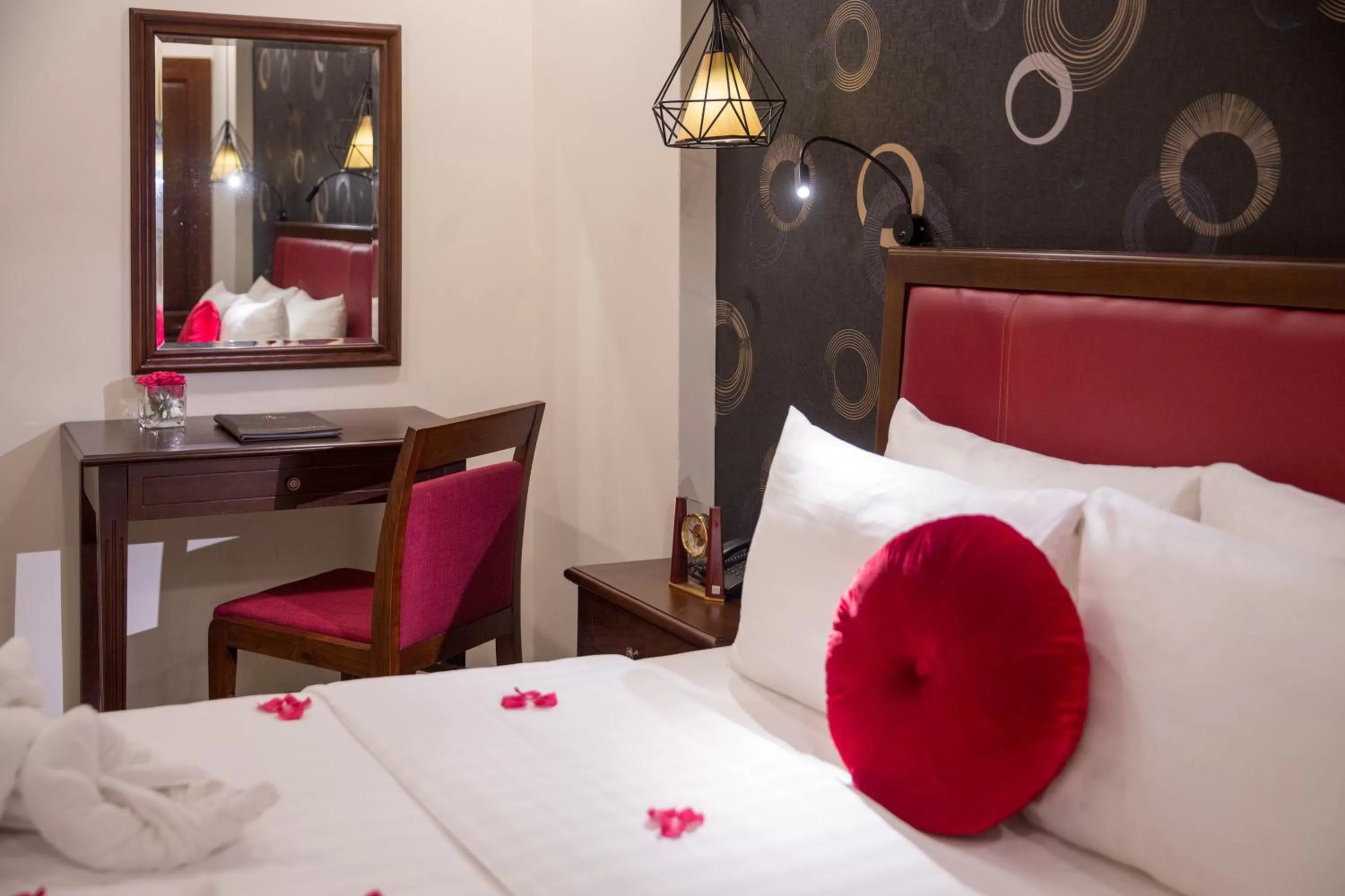 Seating area, Bed in Holiday Emerald Hotel