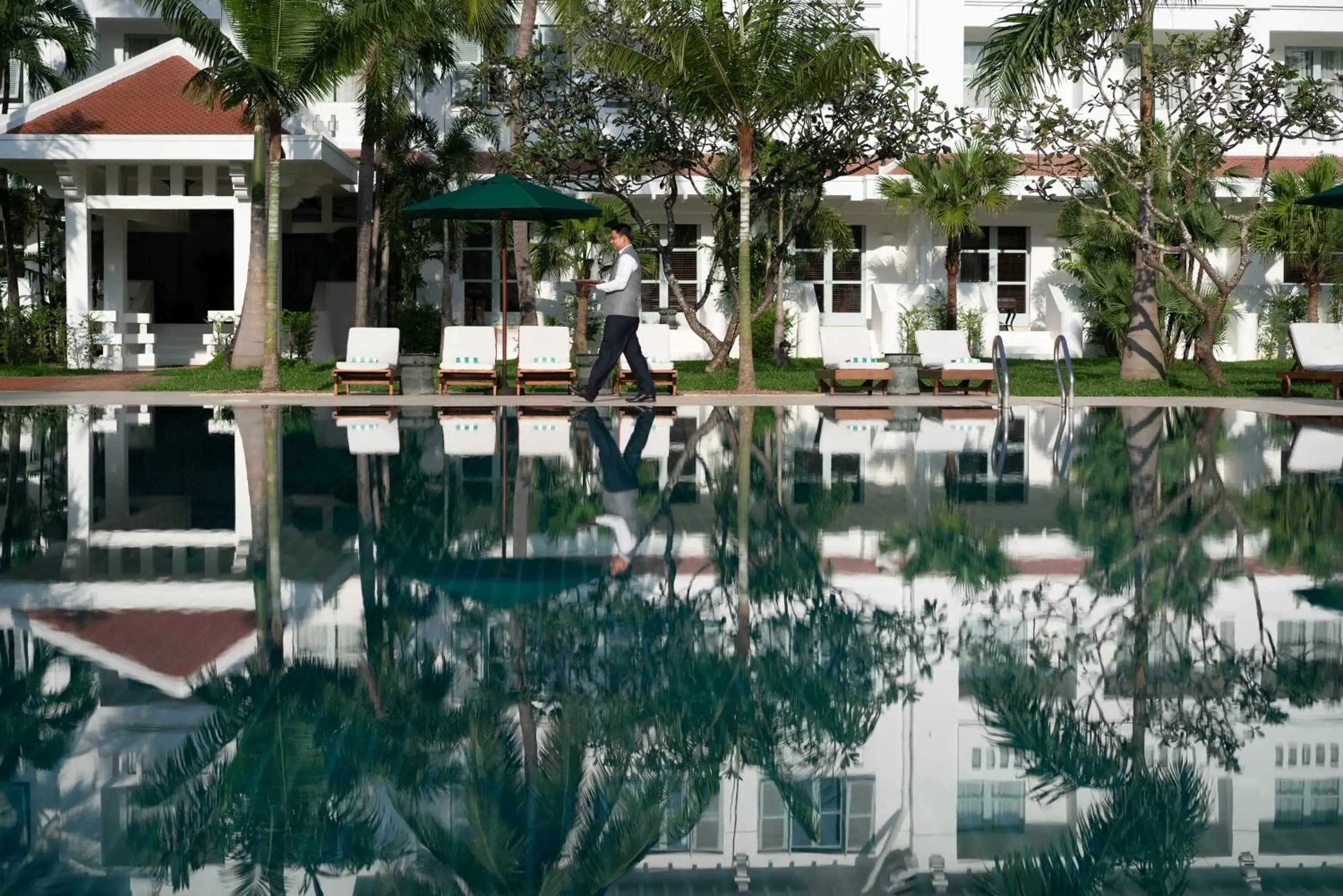 Swimming pool in Raffles Grand Hotel d'Angkor Swimming pool in Raffles Grand Hotel d'Angkor