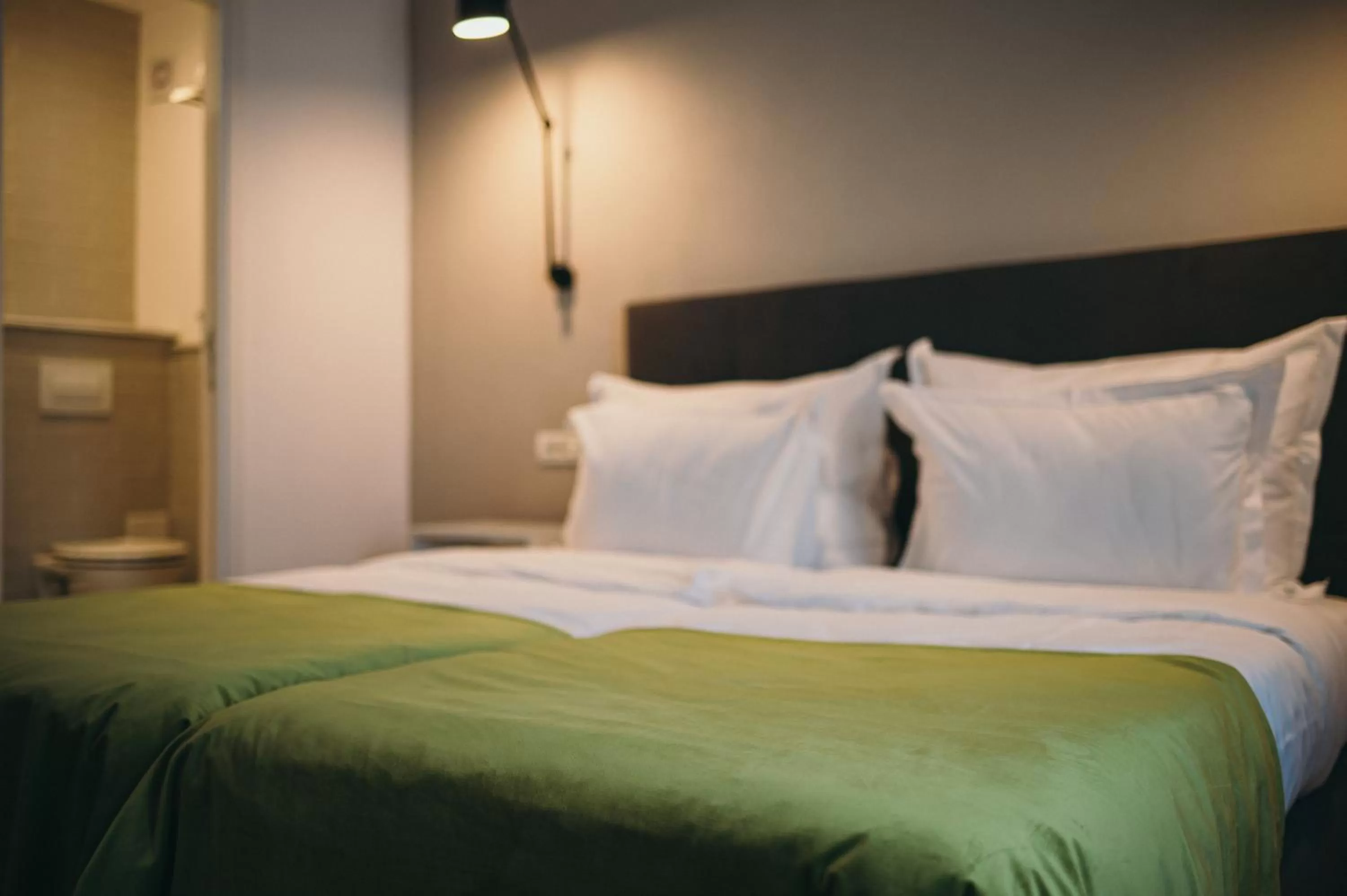 Bed in Nest Guesthouse